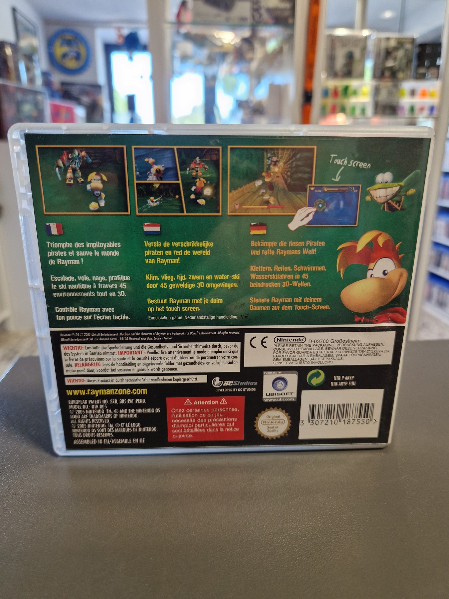 Rückseite der Rayman DS Hülle mit Spielbeschreibung, Screenshots und Barcode 3307210187550.