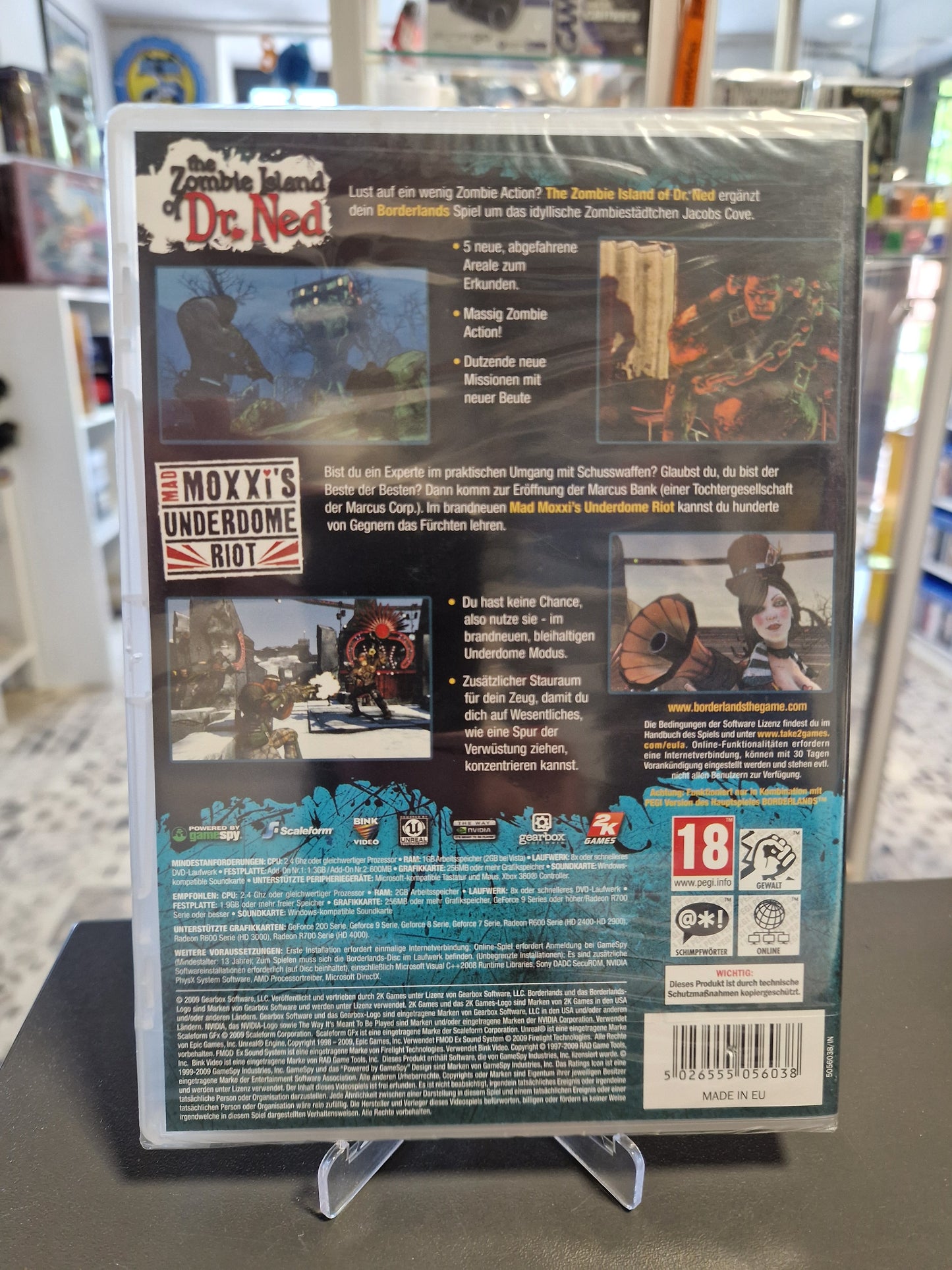 Rückseite der Borderlands Add-on Doppelpack Spieleverpackung mit deutschen Beschreibungen der Inhalte, Systemanforderungen und Screenshots der Erweiterungen. Neu und eingeschweißt.