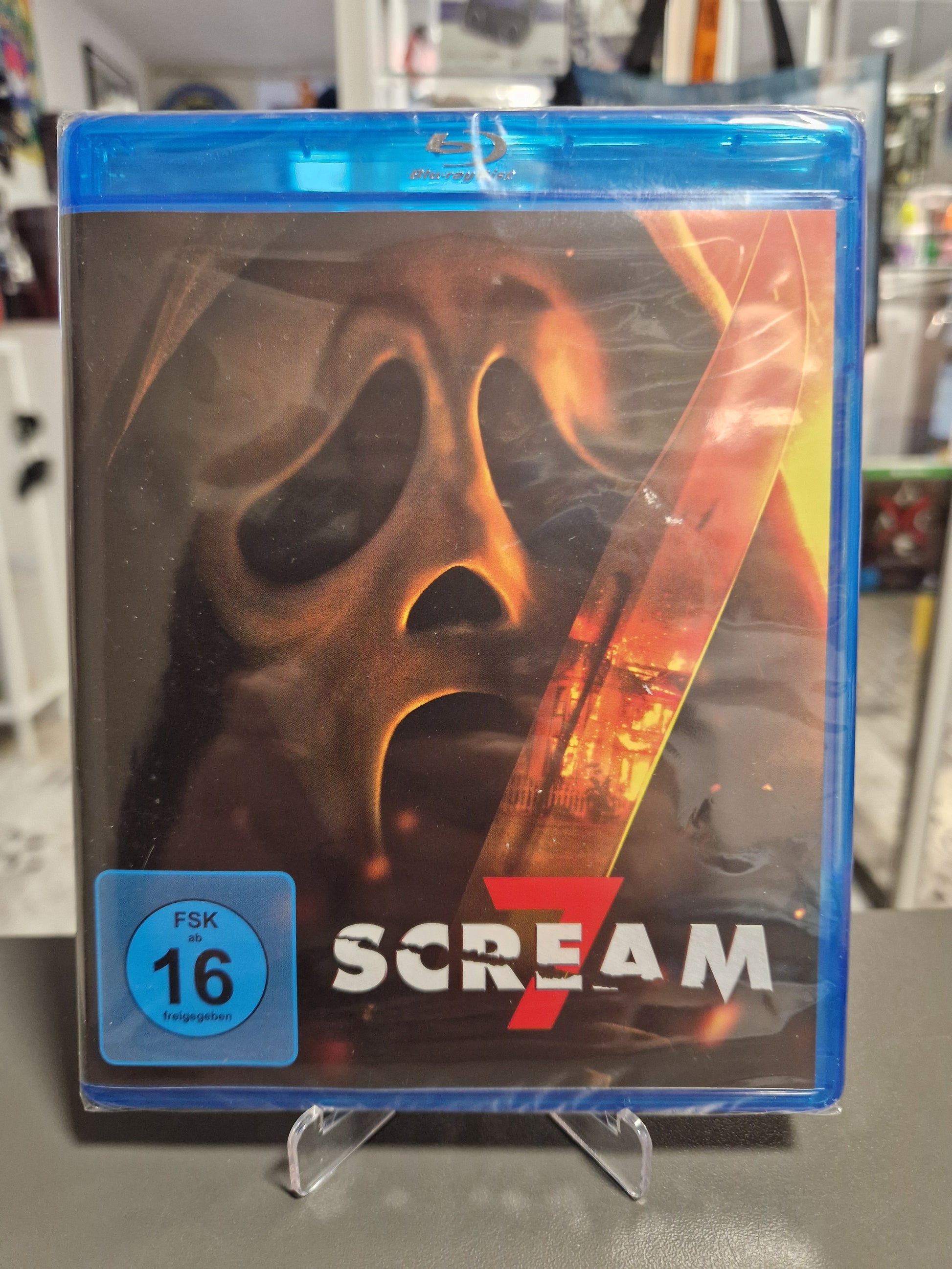 Scream 7 Blu-ray Cover mit FSK 16 Logo und Ghostface Maske – Horrorfilm mit Neve Campbell