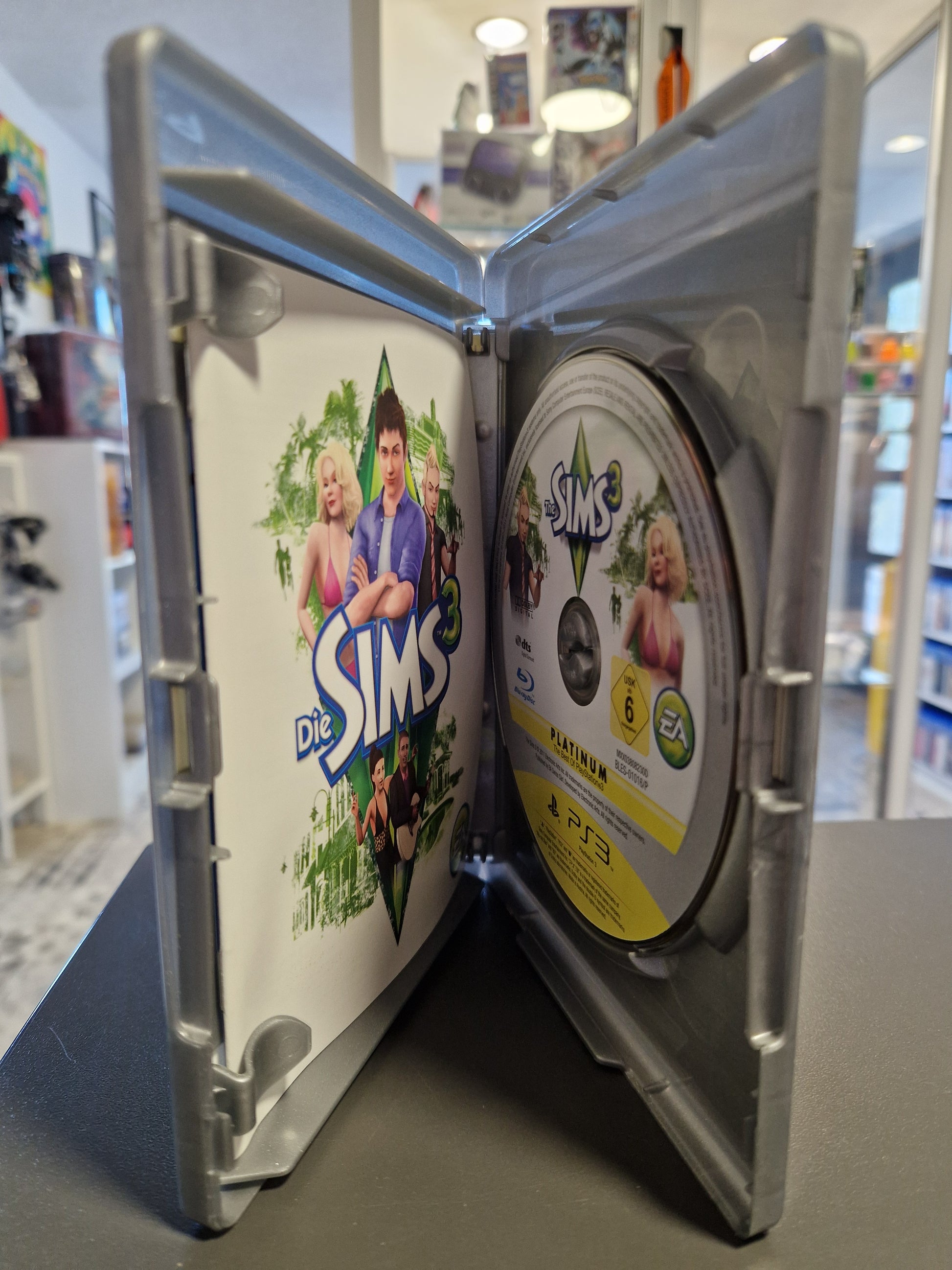 Geöffnete PS3 Hülle mit der kratzerfreien Platinum-Disc und der originalen Anleitung.