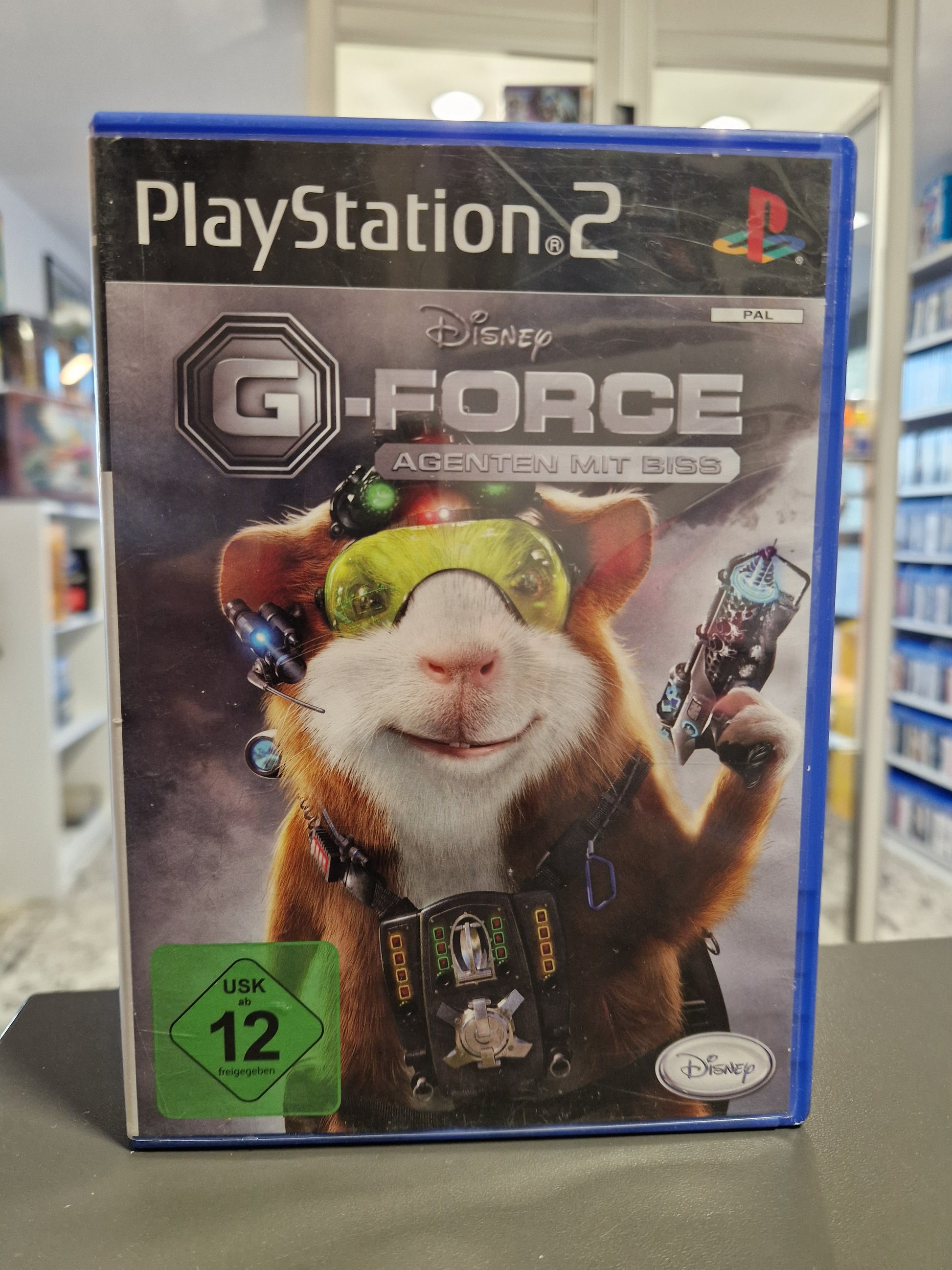 PS2 Cover von Disney G-Force: Agenten mit Biss mit den Meerschweinchen-Agenten.