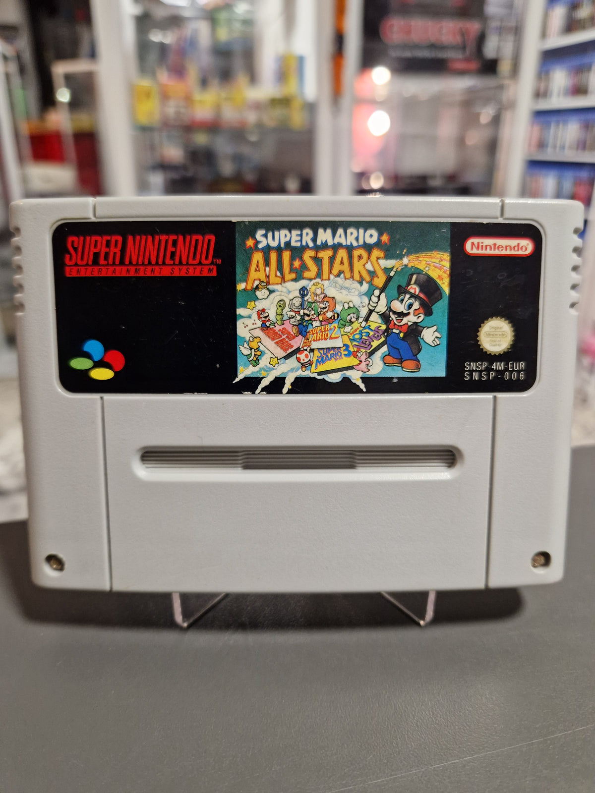 Vorderseite des originalen SNES Moduls Super Mario All Stars PAL Version.