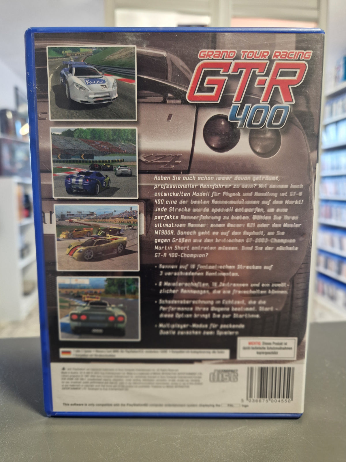 Rückseite der PS2 Hülle von Grand Tour Racing GTR-400 mit Ingame-Screenshots und Barcode 5036675004550.