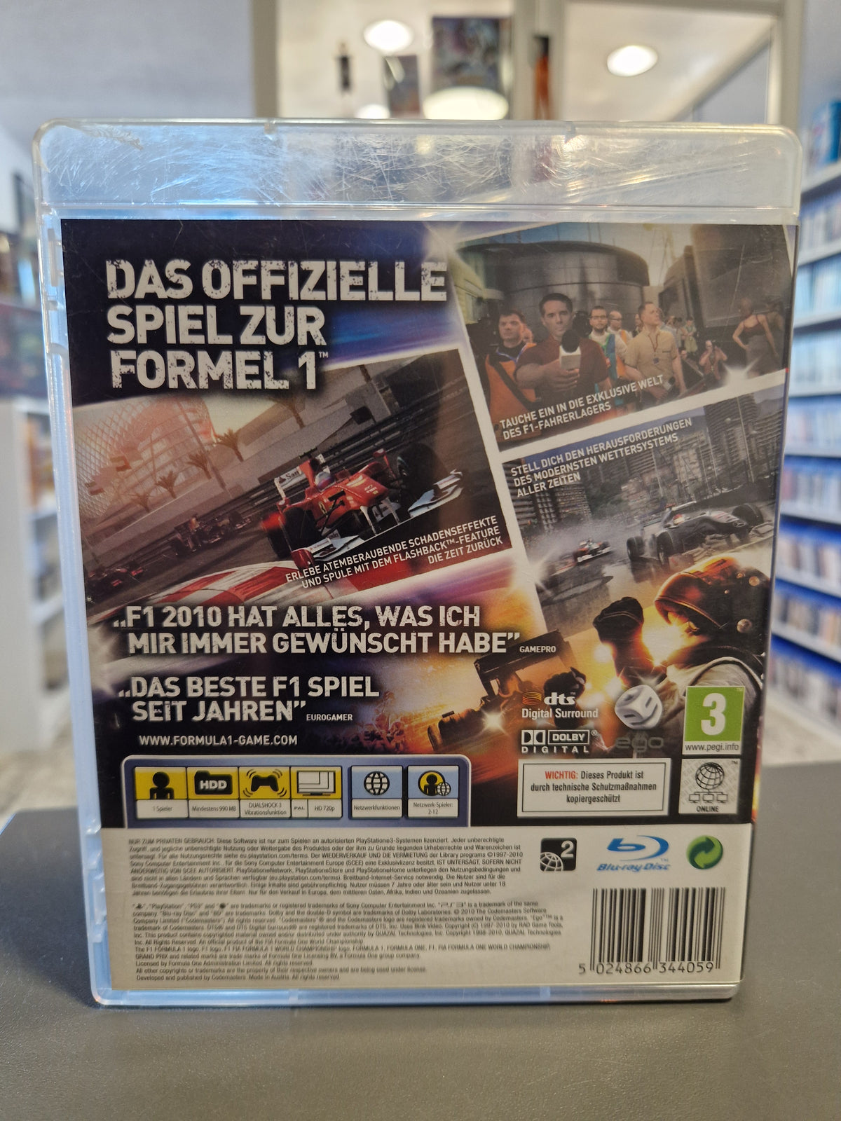 Rückseite der F1 2010 PS3 Hülle mit Feature-Beschreibungen, Pressestimmen und Barcode 5024866344059.