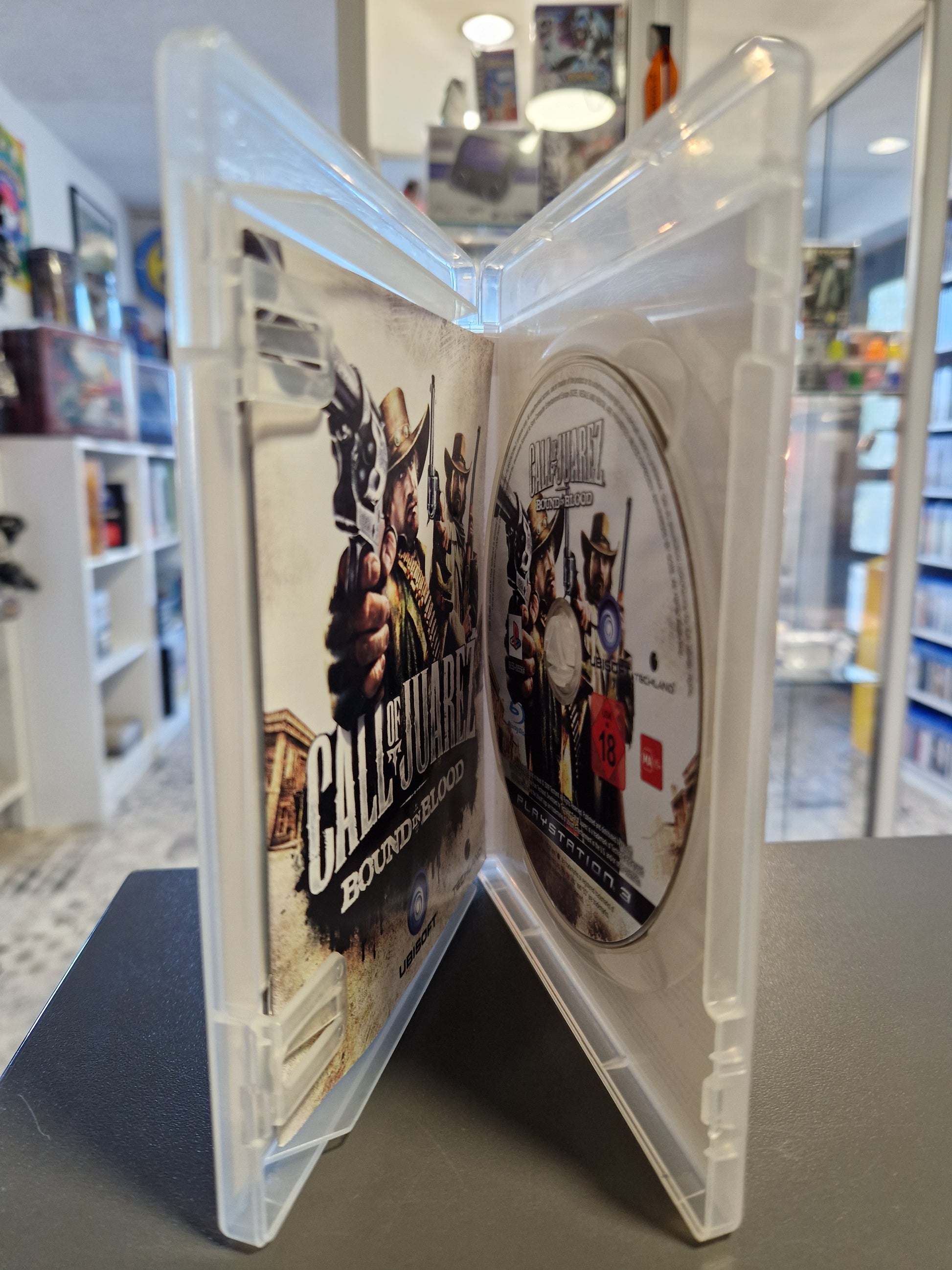 Geöffnete PS3 Hülle mit der kratzerfreien Blu-ray Disc und der originalen Anleitung.