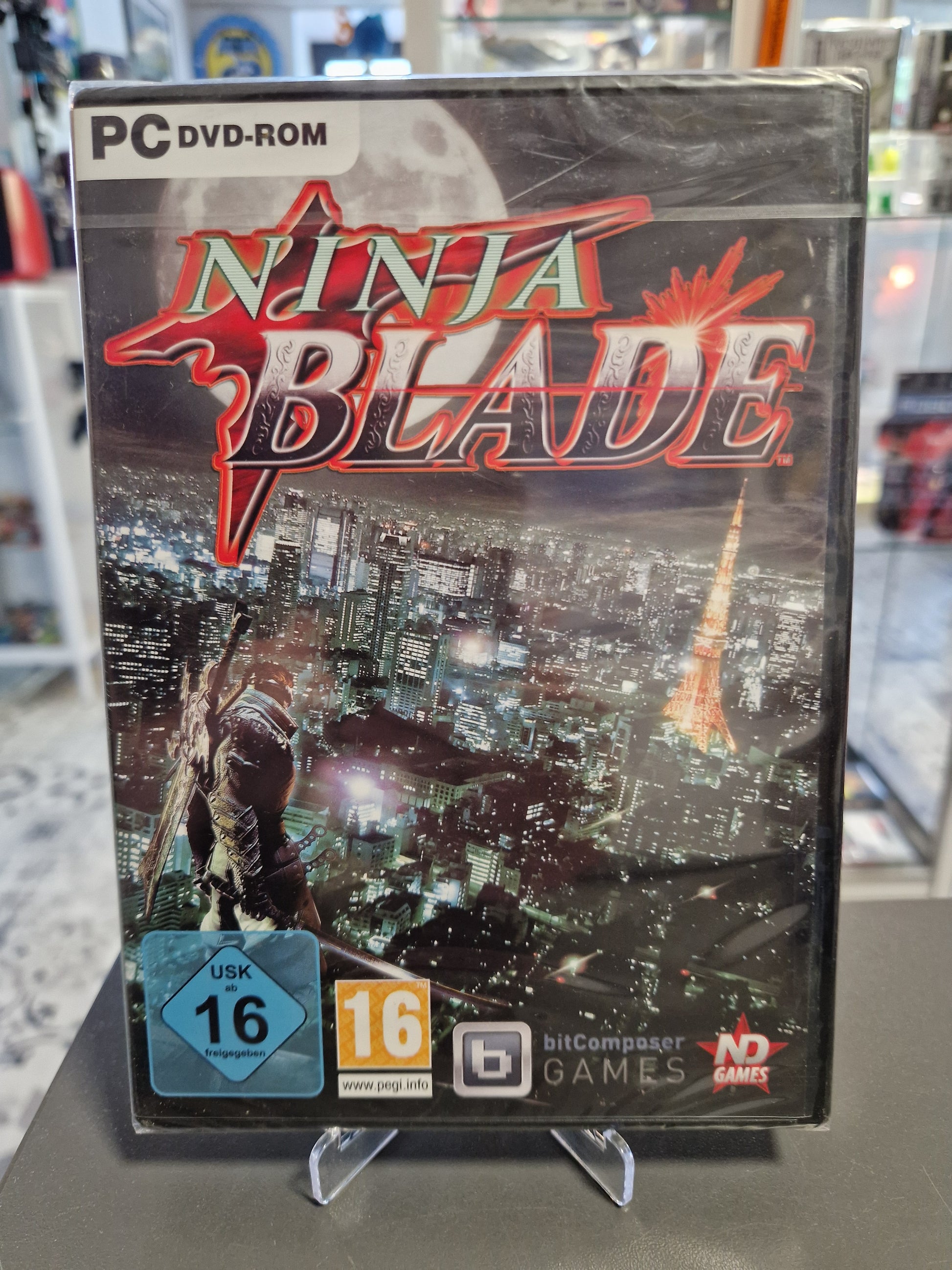 Frontcover der PC-DVD-Hülle von „Ninja Blade“ in Originalfolie, zeigt einen Ninja auf einem Hochhaus mit Blick auf das nächtliche Tokyo.