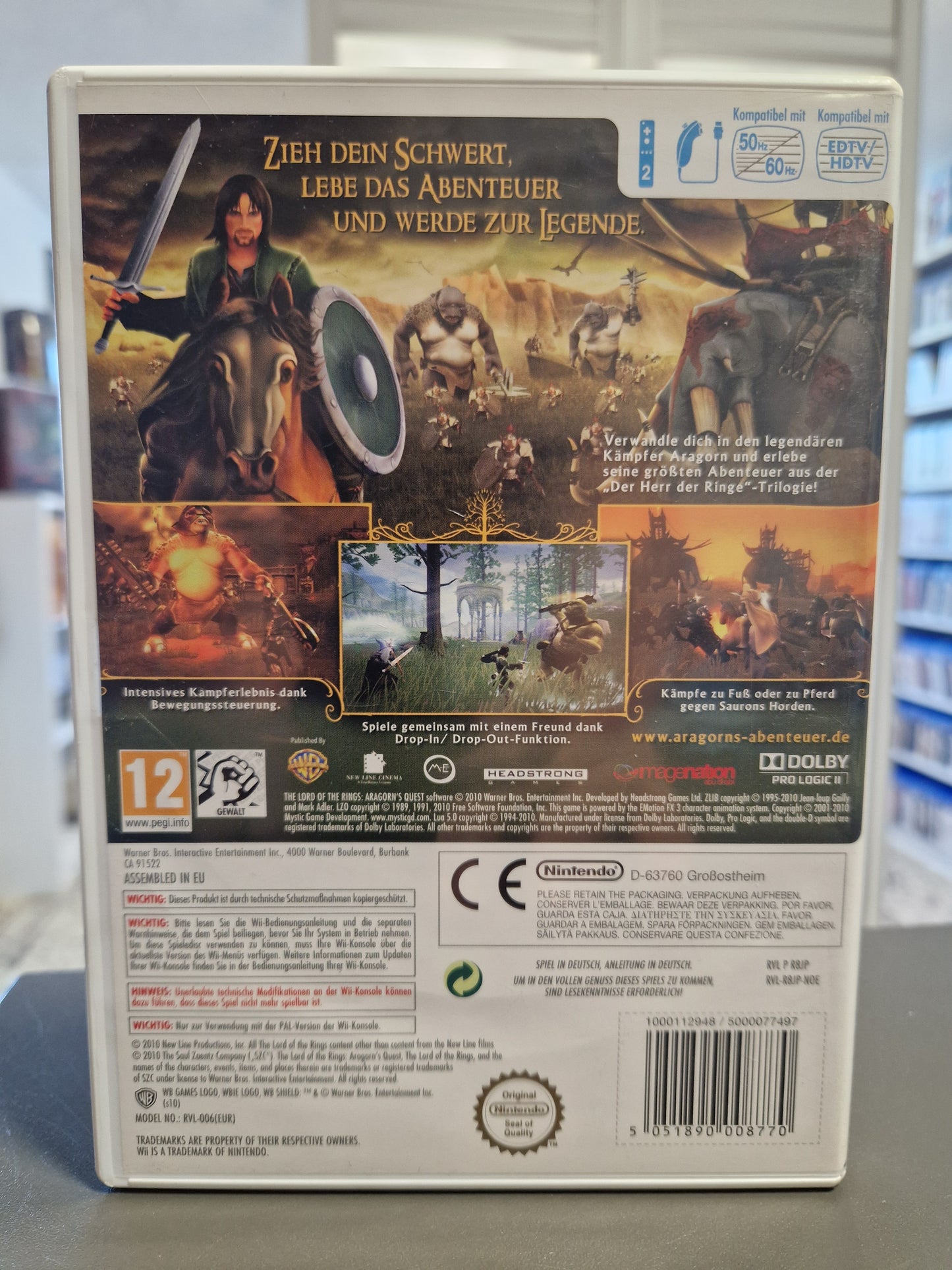 Rückseite der Die Abenteuer von Aragorn Wii Hülle mit Screenshots, Feature-Beschreibungen und Barcode 5051890008770.