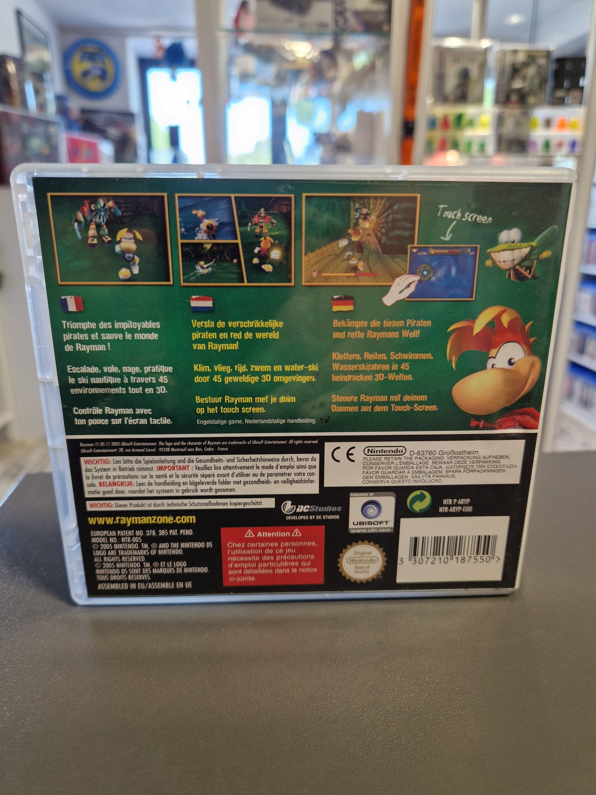 Rückseite der Rayman DS Hülle mit Spielbeschreibung, Screenshots und Barcode 3307210187550.