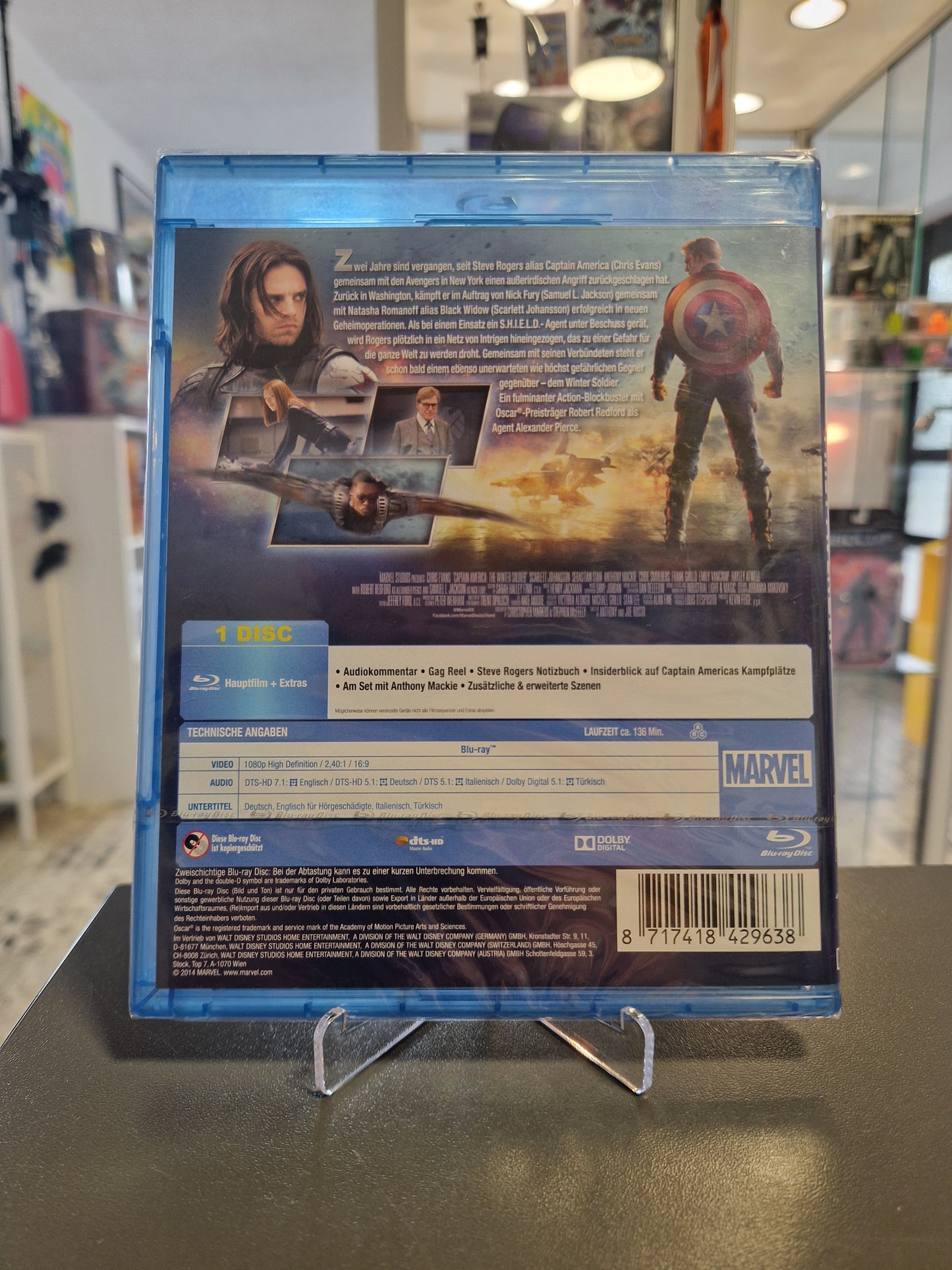 Rückseite der originalverschweißten Blu-ray-Hülle mit packenden Inhaltsangaben, technischen Spezifikationen zu Tonspuren und Untertiteln sowie dem Barcode der deutschen Verkaufsversion.