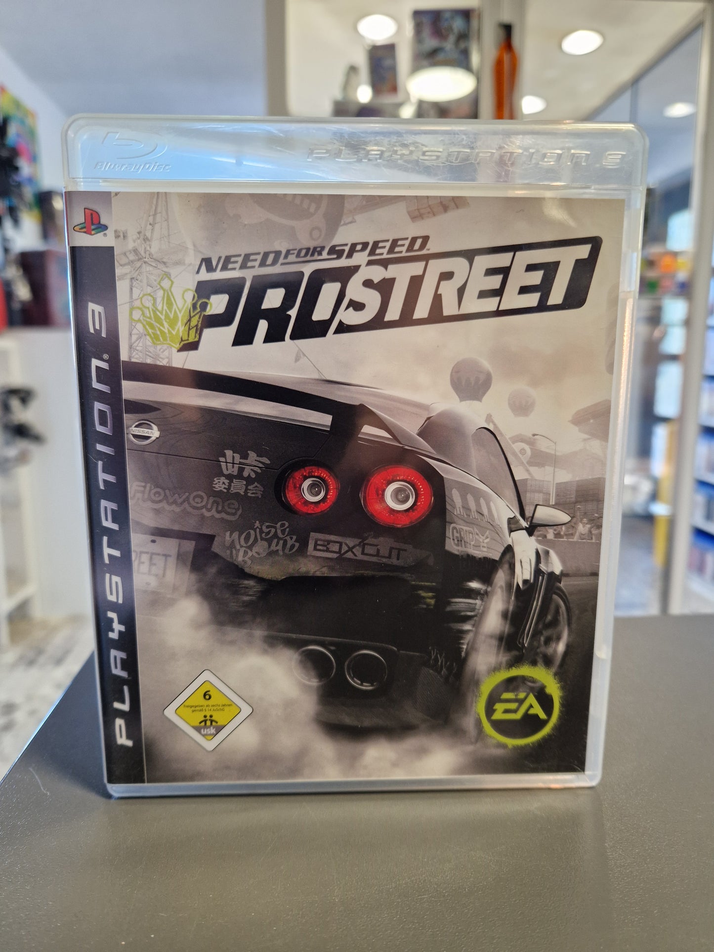 Need for Speed ProStreet PS3 Cover mit dem ikonischen getunten Mazda RX-7.