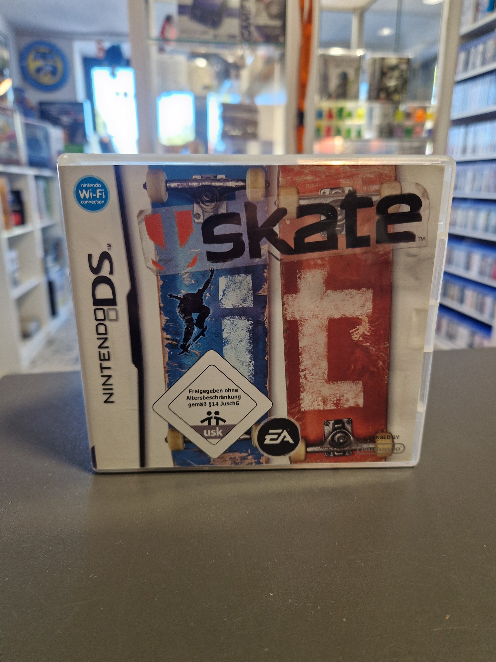 Skate It Nintendo DS Hülle mit dem dynamischen Skateboard-Cover.