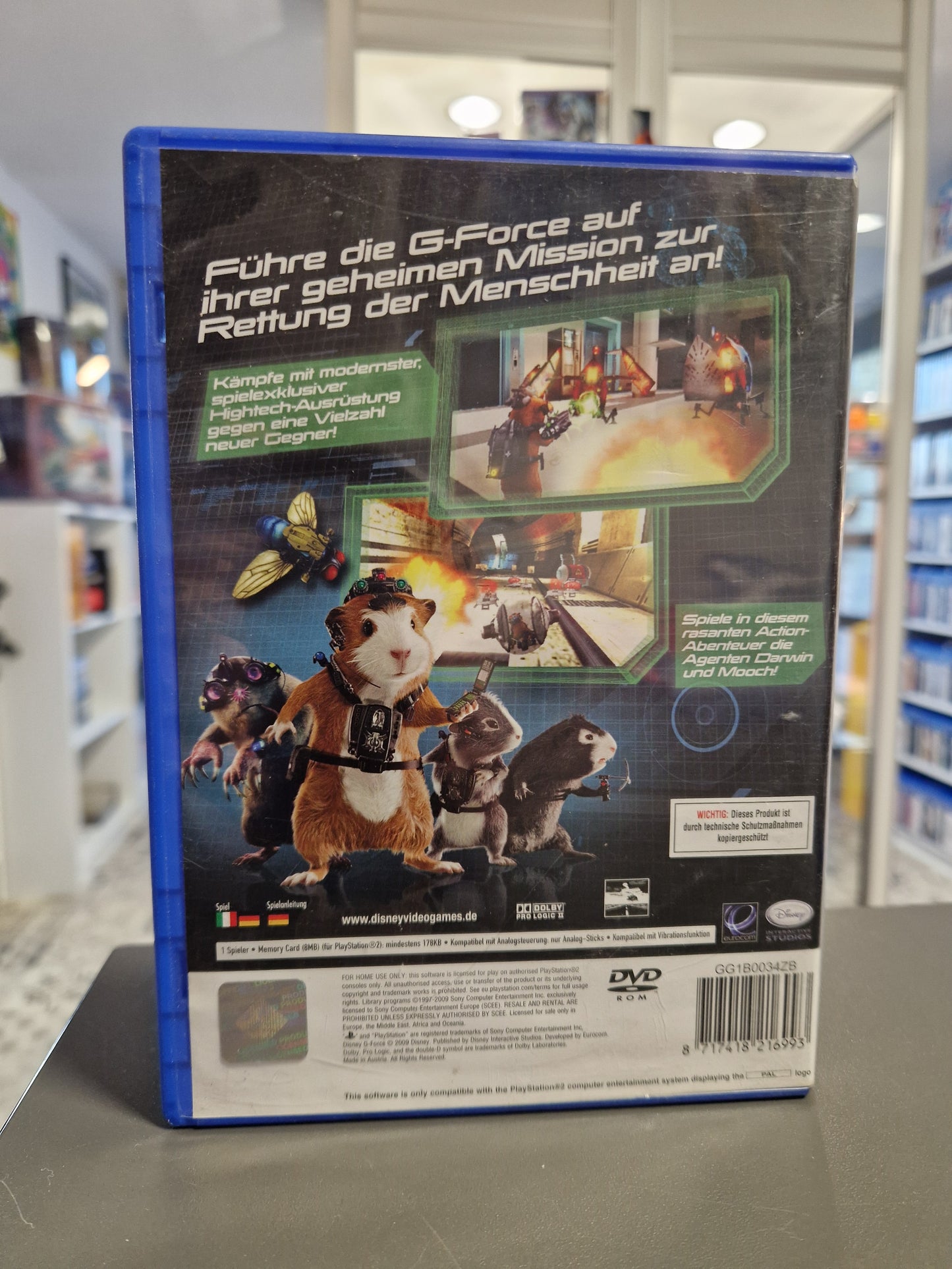 Rückseite der Verpackung mit Spielszenen und Gadget-Beschreibungen.