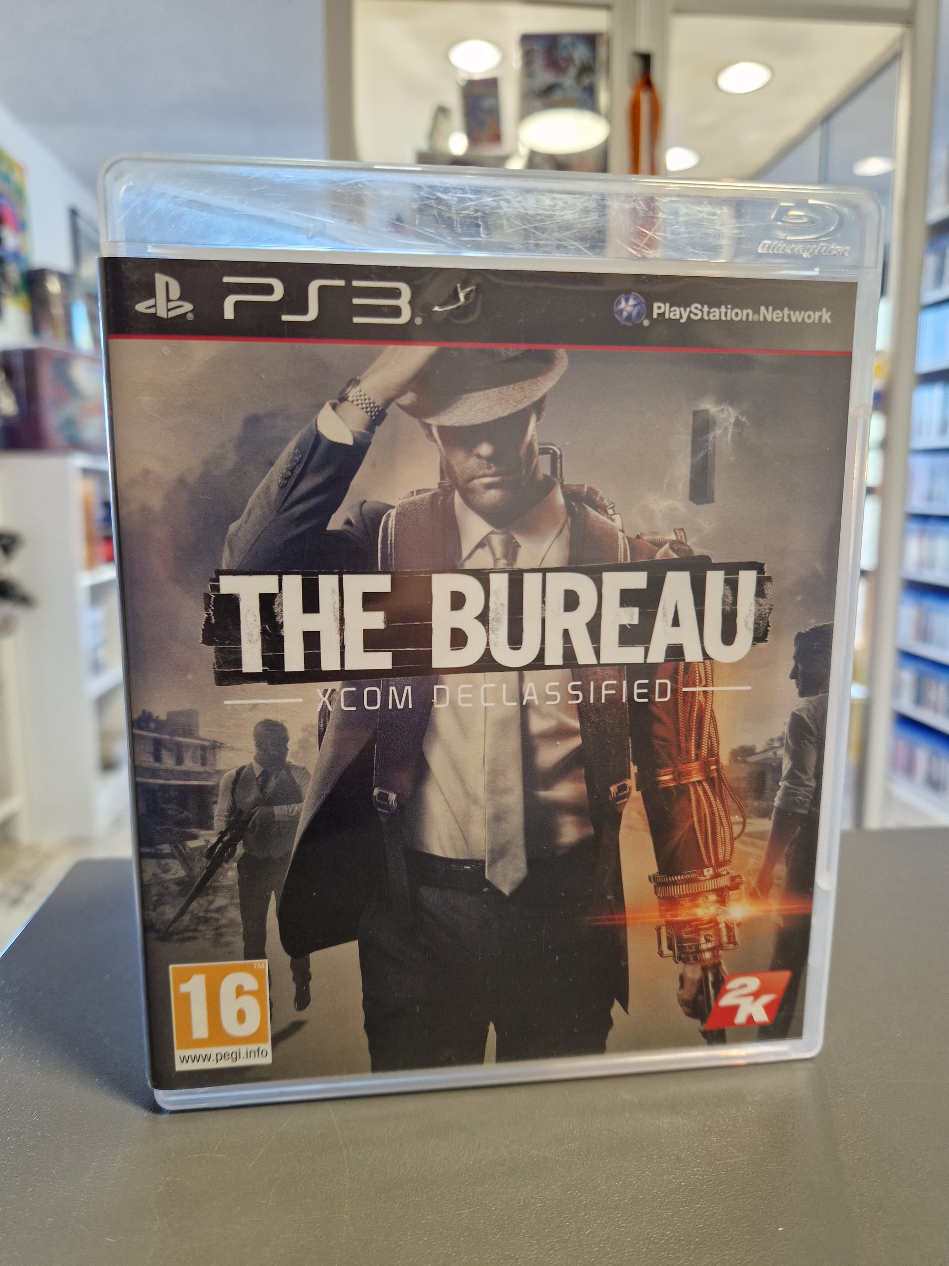 Cover von The Bureau: XCOM Declassified für PS3 mit Agent William Carter.
