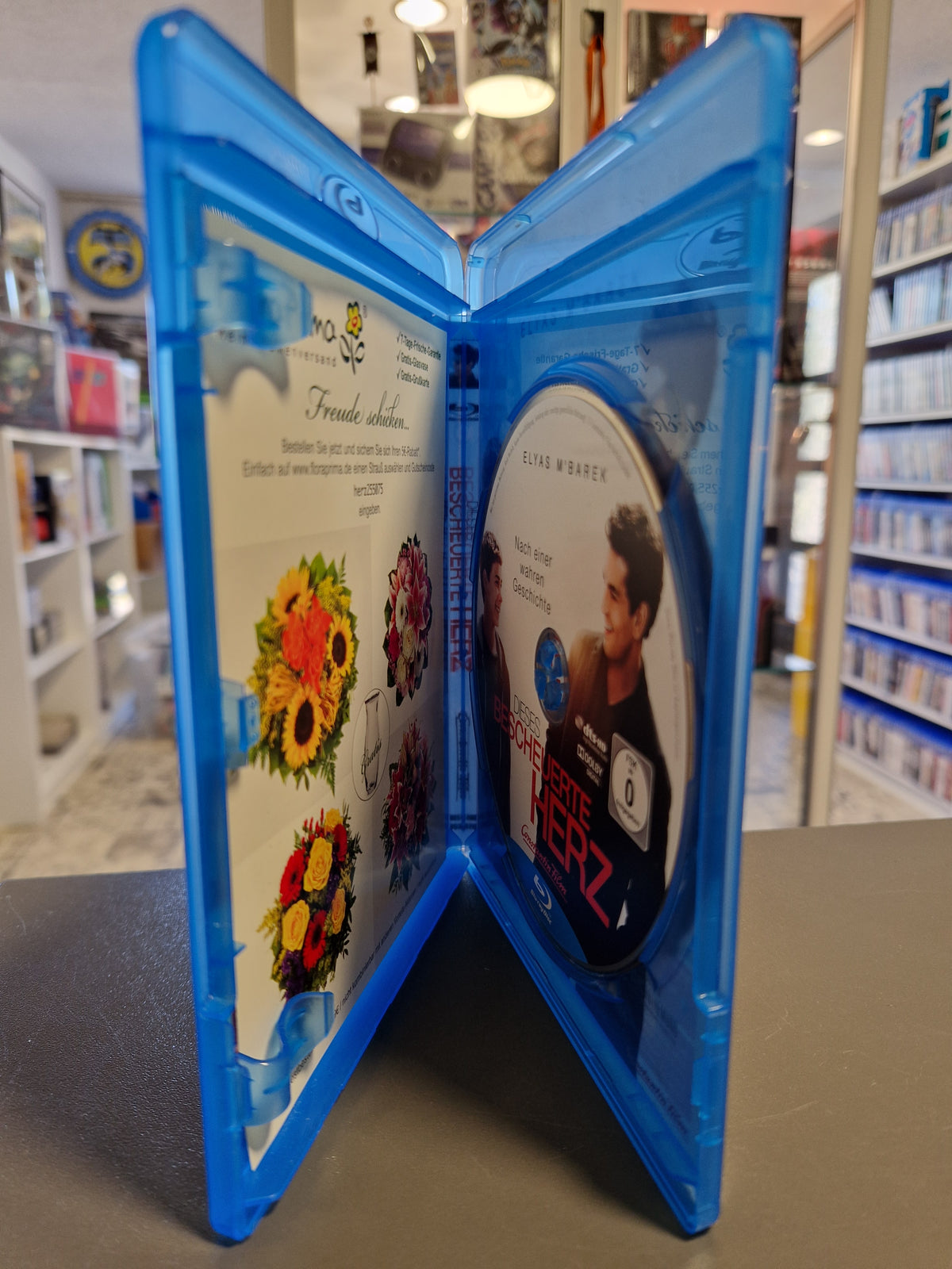 Geöffnete Blu-ray Hülle des Films Dieses bescheuerte Herz mit eingelegter Disc.