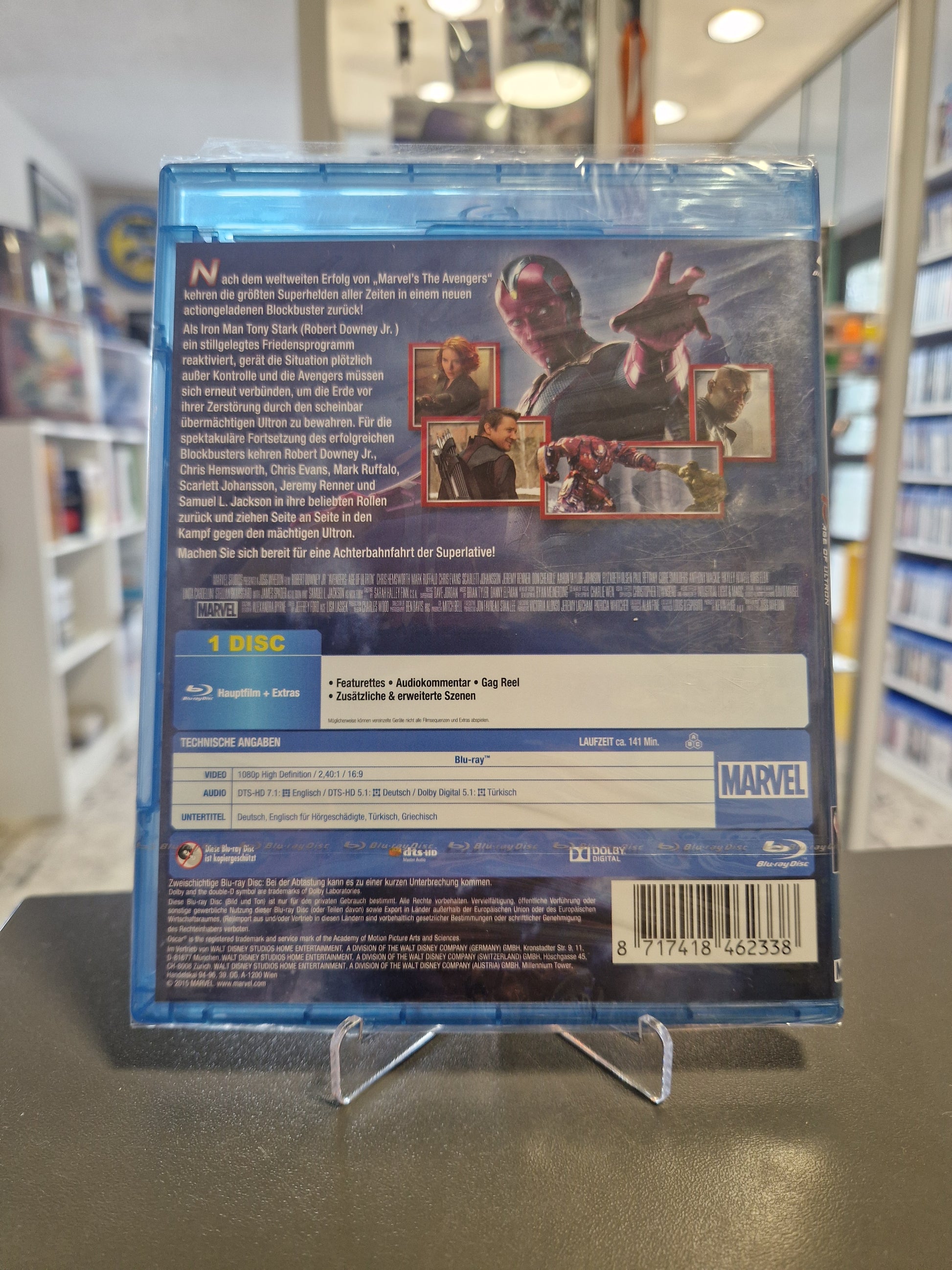 Rückseite der originalverschweißten Blu-ray-Hülle mit Filminformationen, technischen Angaben zu Ton und Untertiteln, Szenenbildern der Charaktere und dem Barcode 8717418462338.