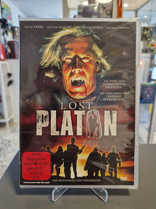 Neu und originalverpackte DVD des Horror-Actionfilms Lost Platon mit FSK 18 Freigabe. Das Cover zeigt das blutverschmierte Gesicht eines Vampirs mit Fangzähnen sowie Soldaten als Silhouetten vor einem brennenden Himmel.