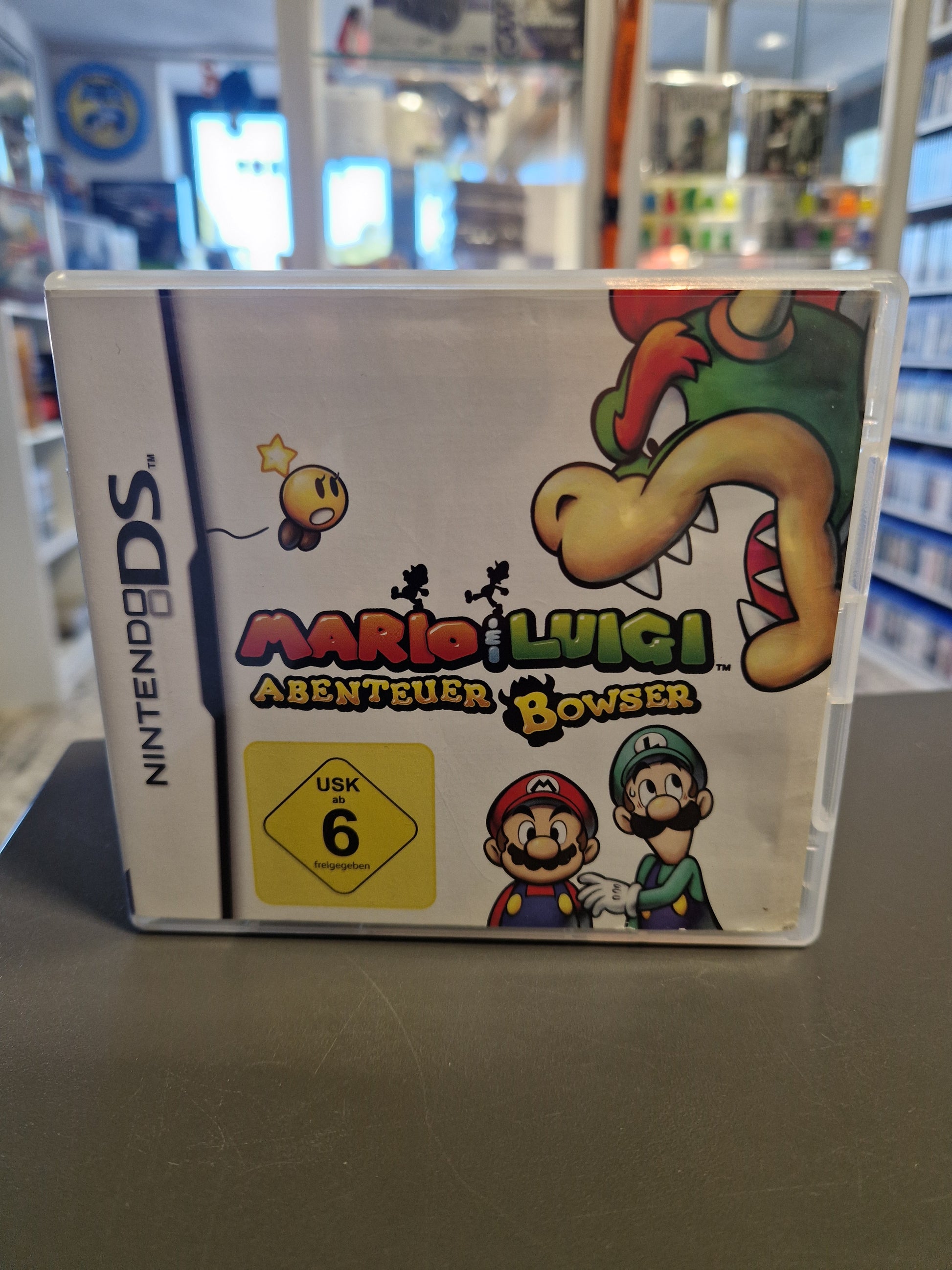 Mario & Luigi Abenteuer Bowser Nintendo DS Hülle mit Gebrauchsspuren am Cover.