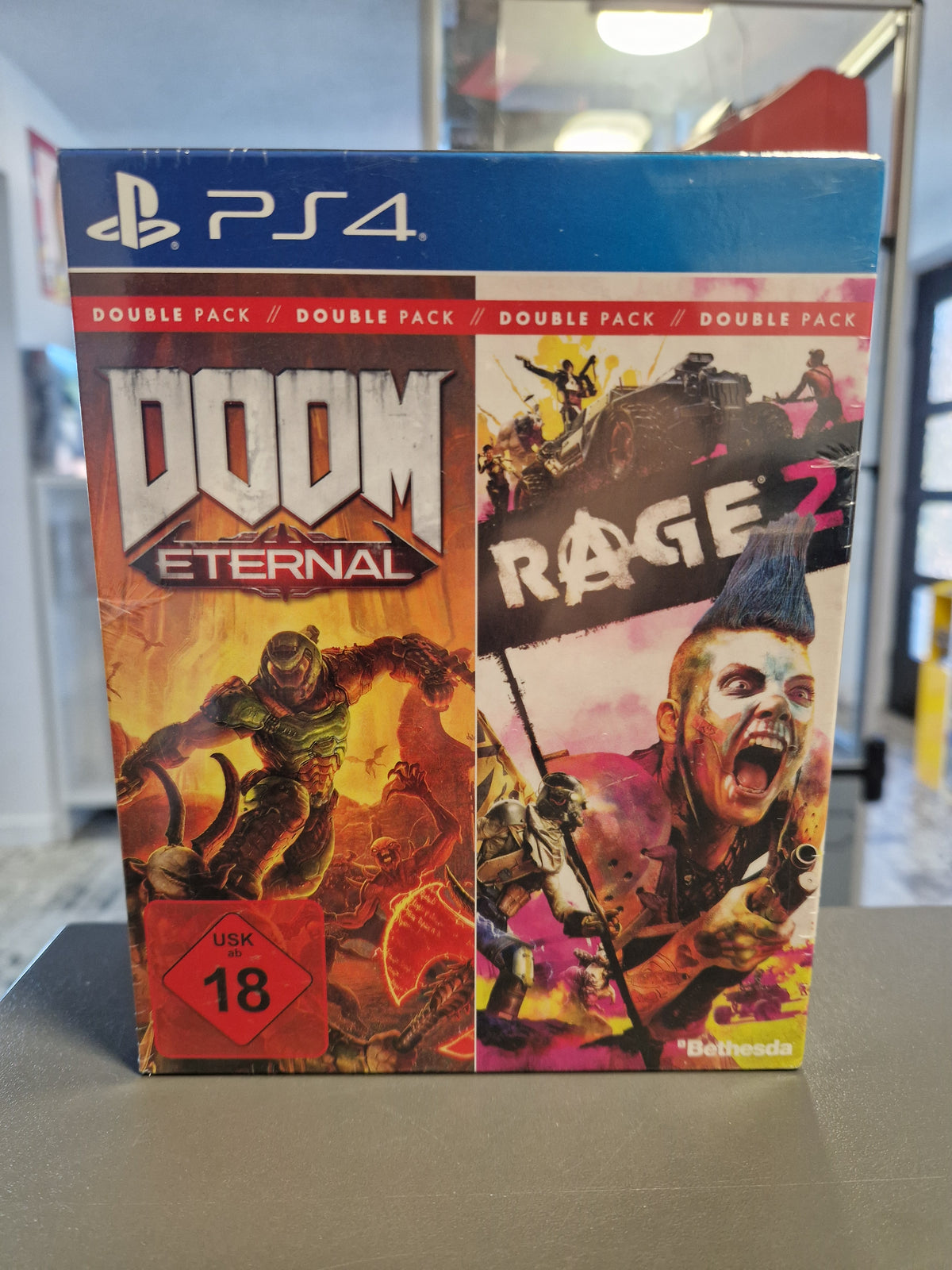 Vorderseite der neu verschweißten PS4 Hülle Doom Eternal und Rage 2 Double Pack im Schuber.