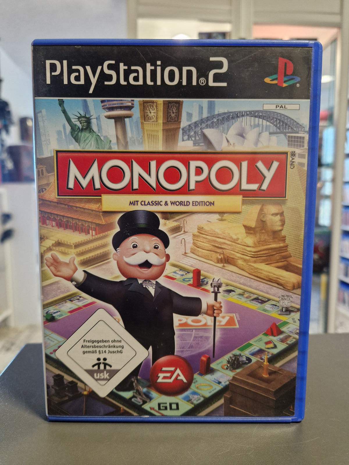 Vorderseite der PS2 Hülle von Monopoly Classic und World Edition mit Mr. Monopoly.