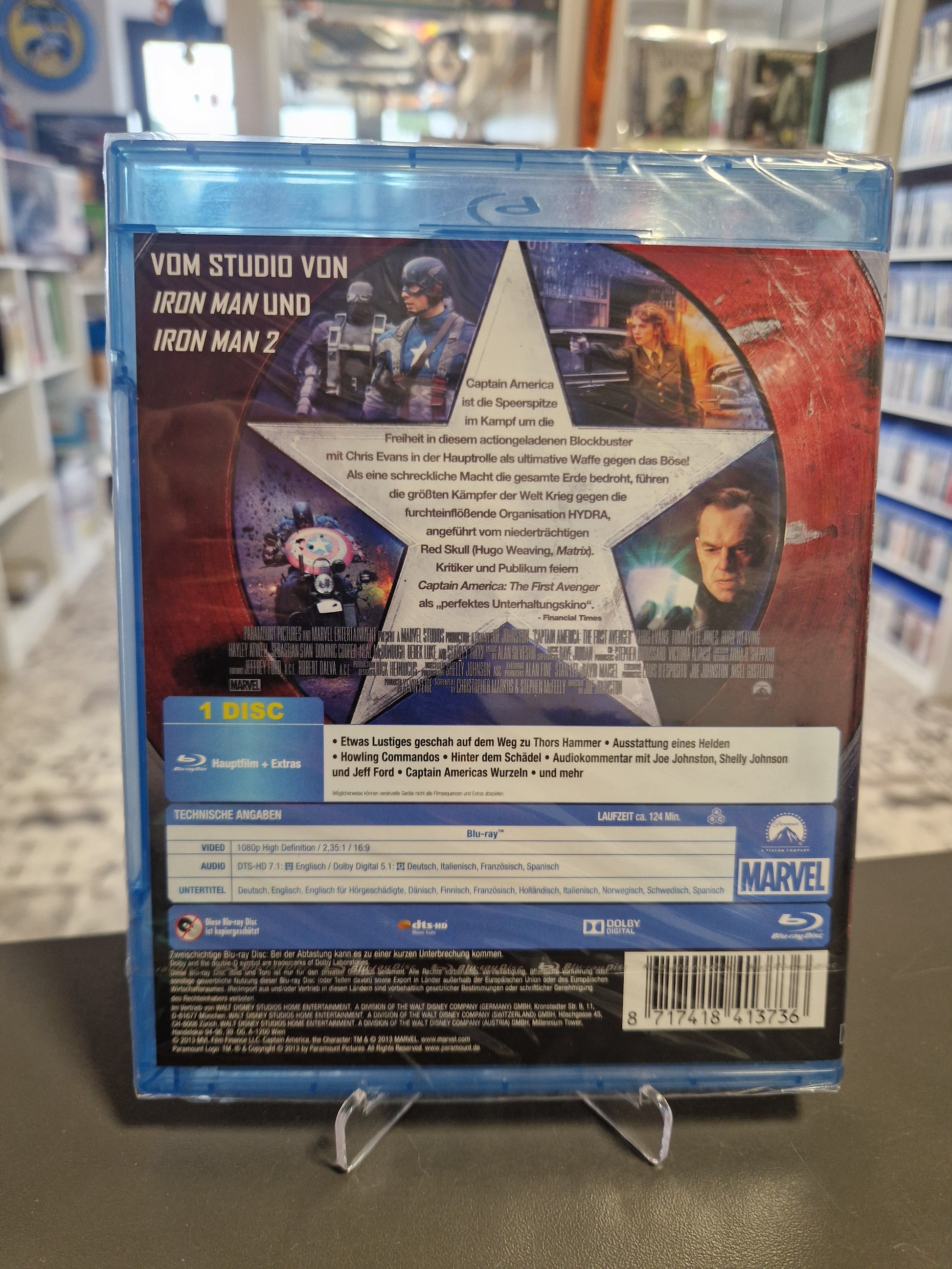 Rückseite der originalverschweißten Blu-ray-Hülle mit Filminformationen, dem Barcode 8717418413736 und Szenenbildern aus dem Marvel-Film.