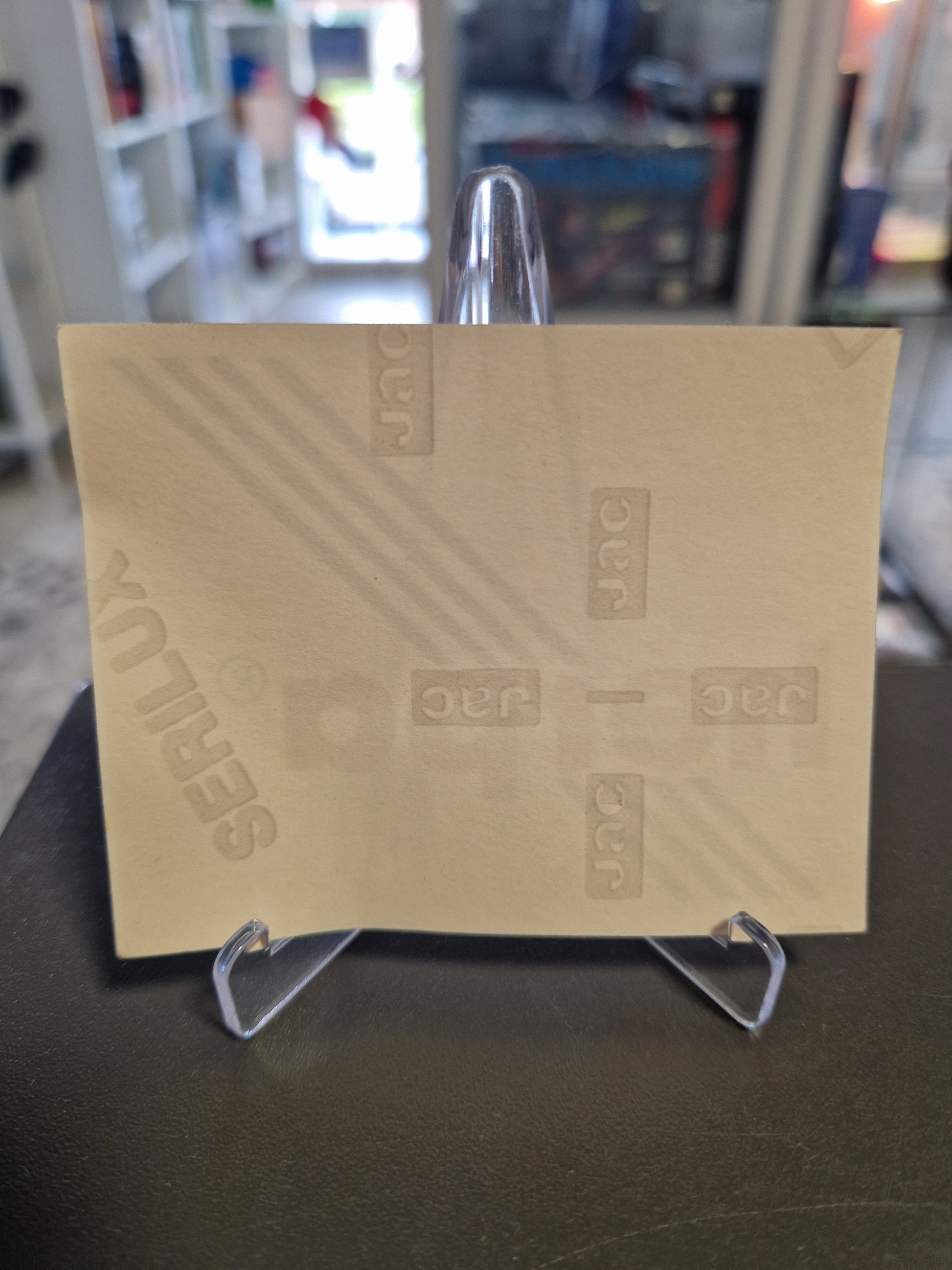 Rückseite des unbenutzten Herpa Stickers mit jac Serilux Trägerpapier
