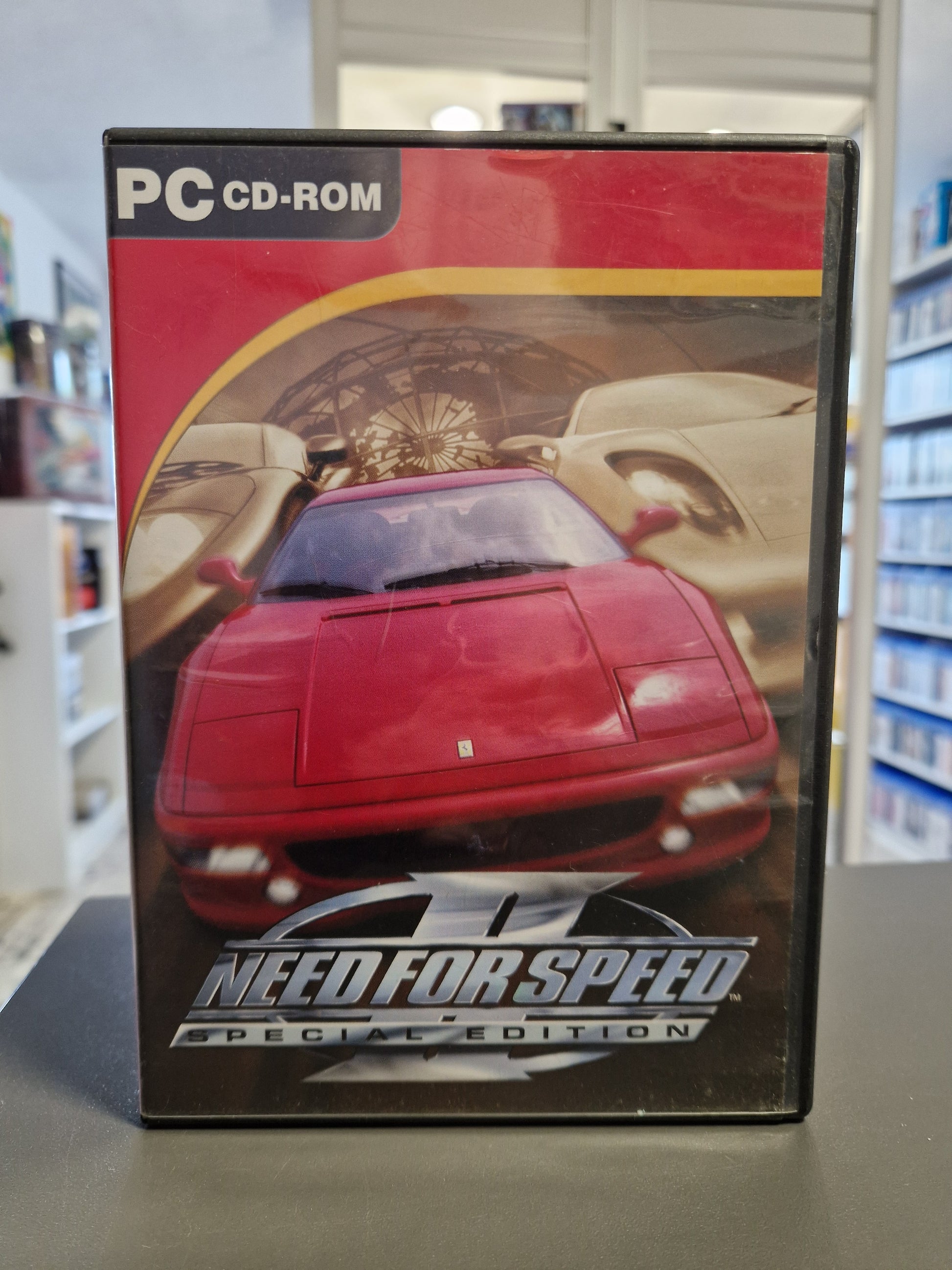 Frontcover von Need for Speed II Special Edition mit dem roten Ferrari F355.