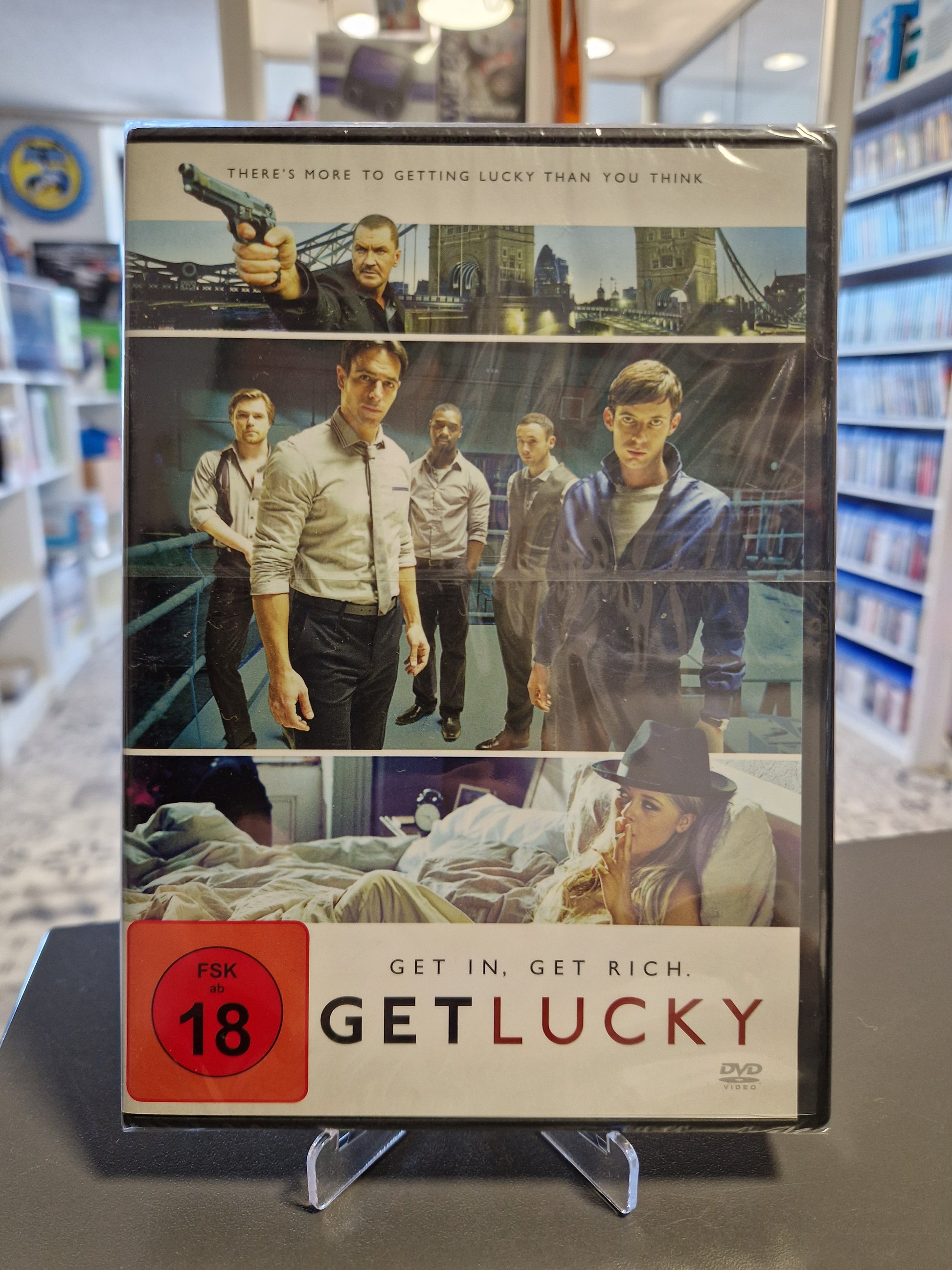 Neu und originalverpackte DVD des Action-Thrillers Get Lucky mit FSK 18 Freigabe, inklusive Filmlogo und Szenenbildern mit Luke Treadaway vor einer Londoner Kulisse.