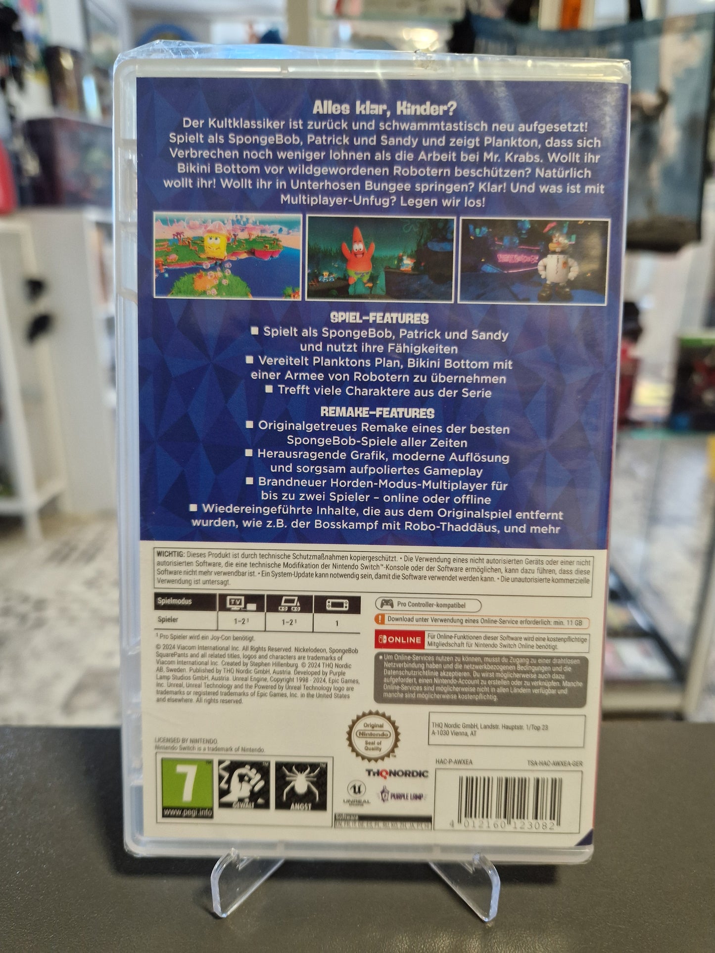 Rückseite der verschweißten Hülle von SpongeBob Schwammkopf Rehydrated für Nintendo Switch mit Feature-Auflistung, Spiel-Screenshots, Systemanforderungen und dem Barcode EAN 4012160123082.