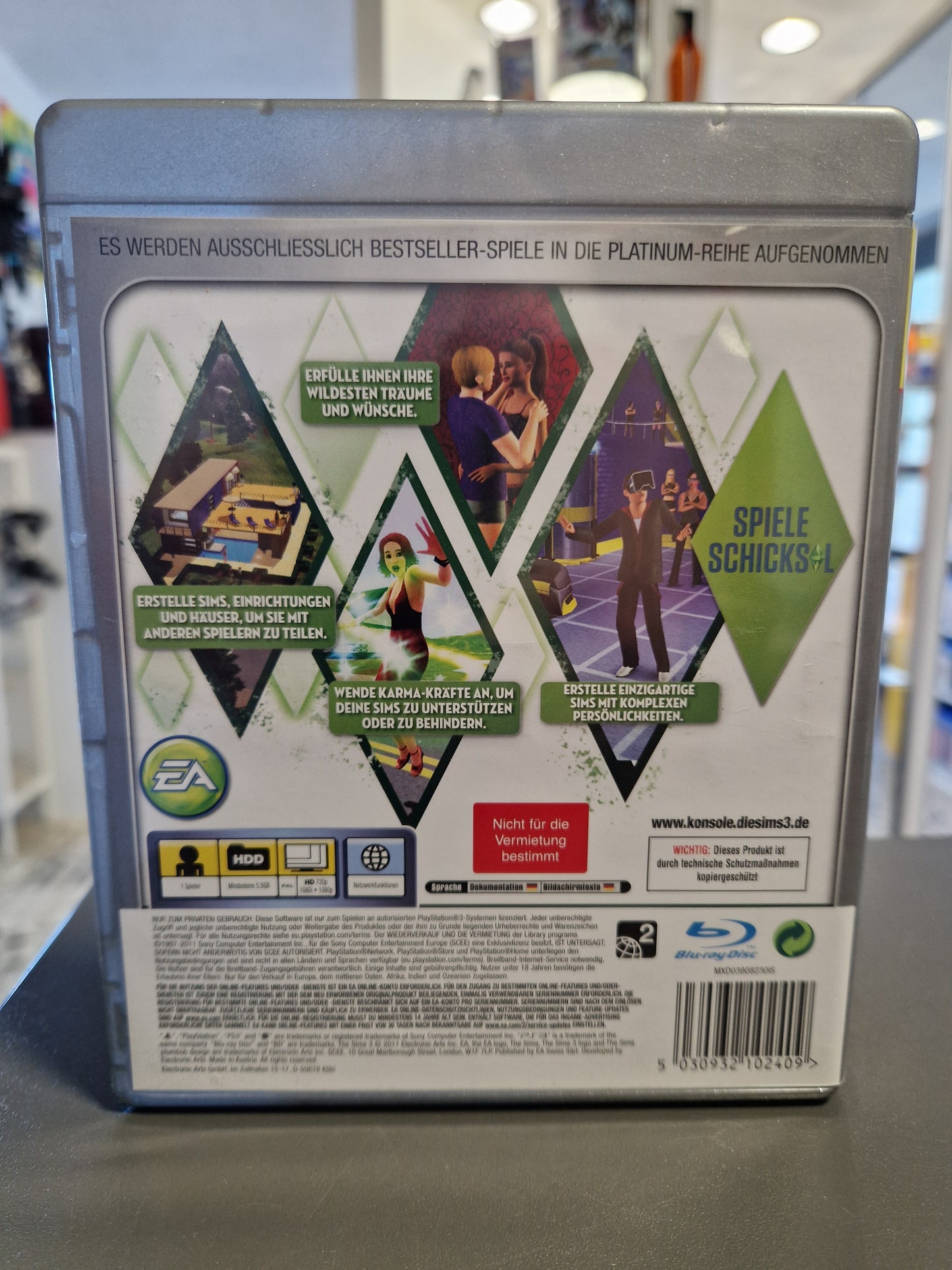 Rückseite der Platinum-Verpackung mit Spielszenen, Features und dem Barcode 5030932102409.