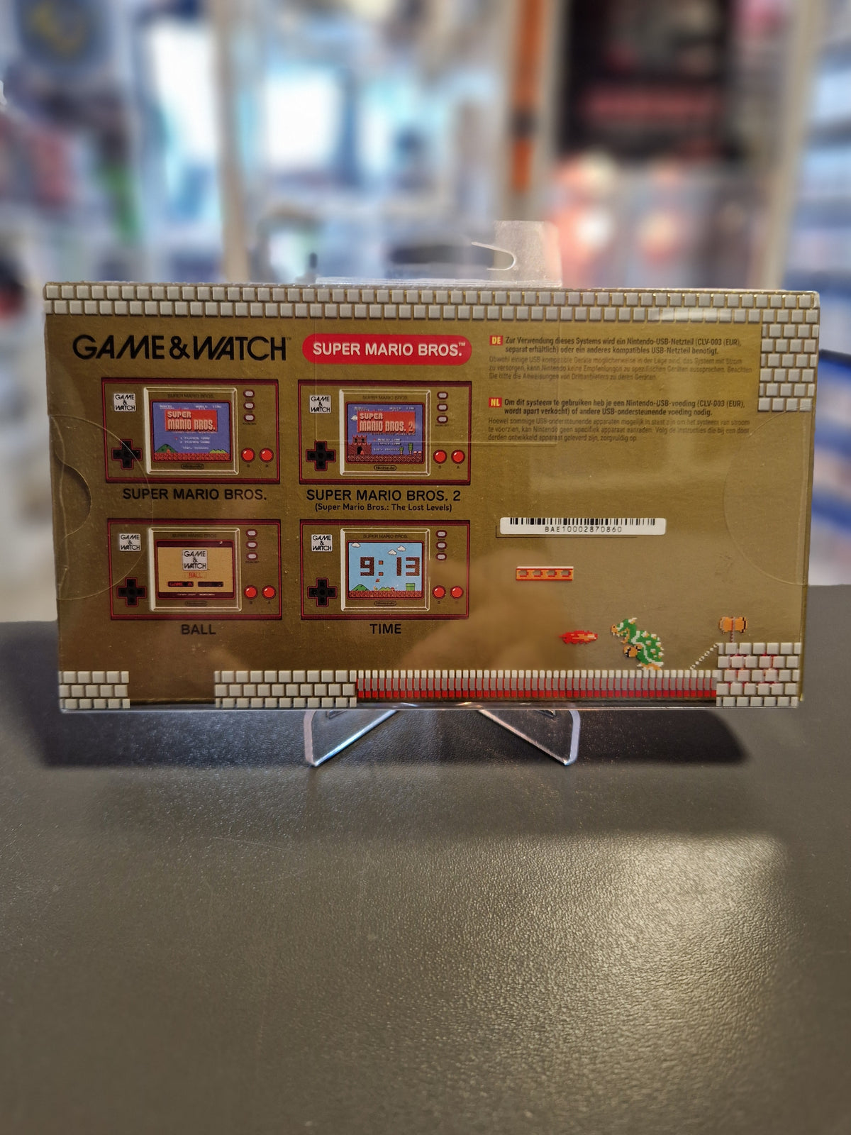 Rückseite der Verpackung der Game and Watch Super Mario Bros Handheld Konsole.