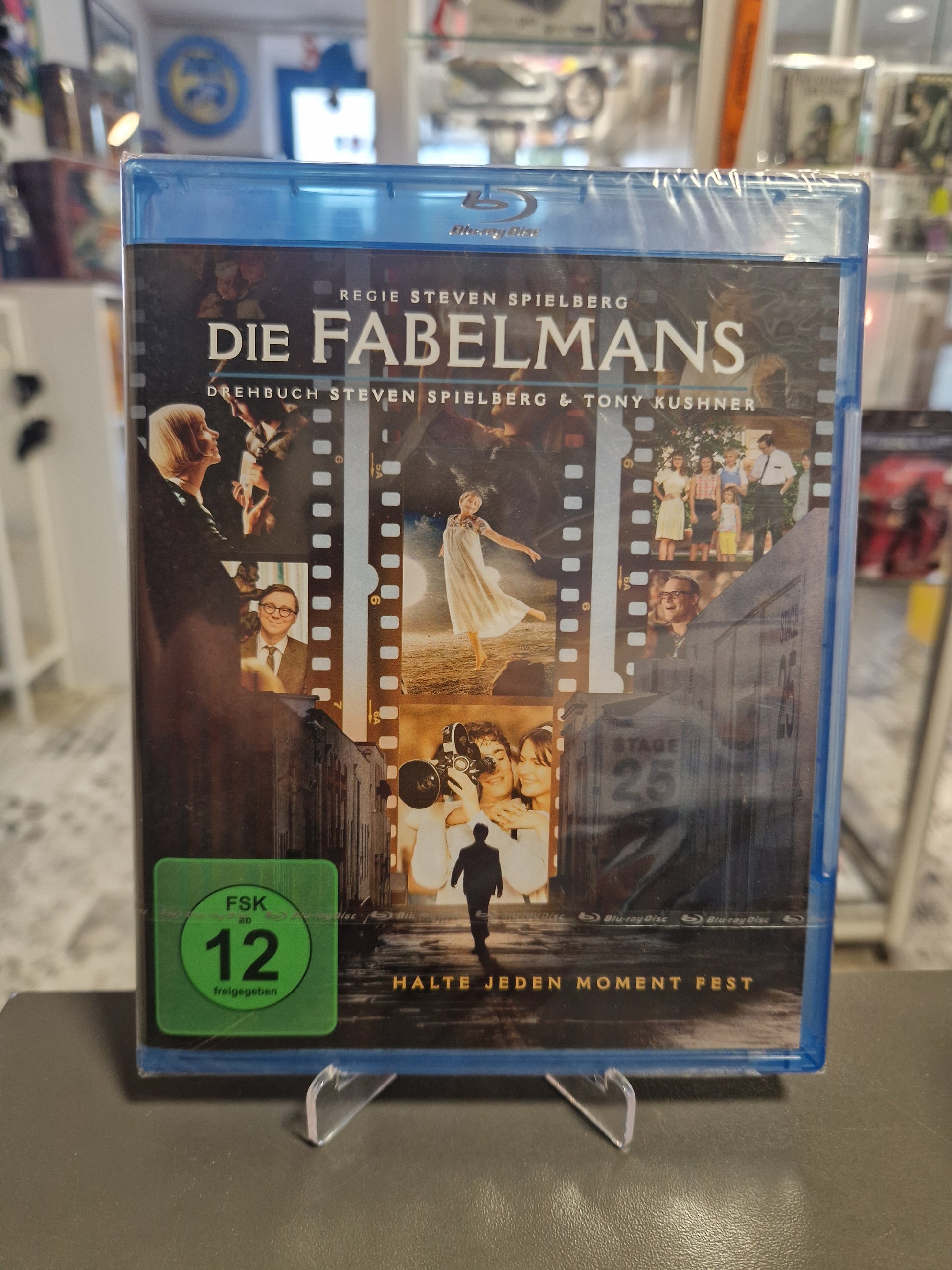 Vorderseite der Blu-ray-Hülle des Films Die Fabelmans von Regisseur Steven Spielberg, originalverpackt in Folie mit FSK 12 Logo bei Memory Lane Games.
