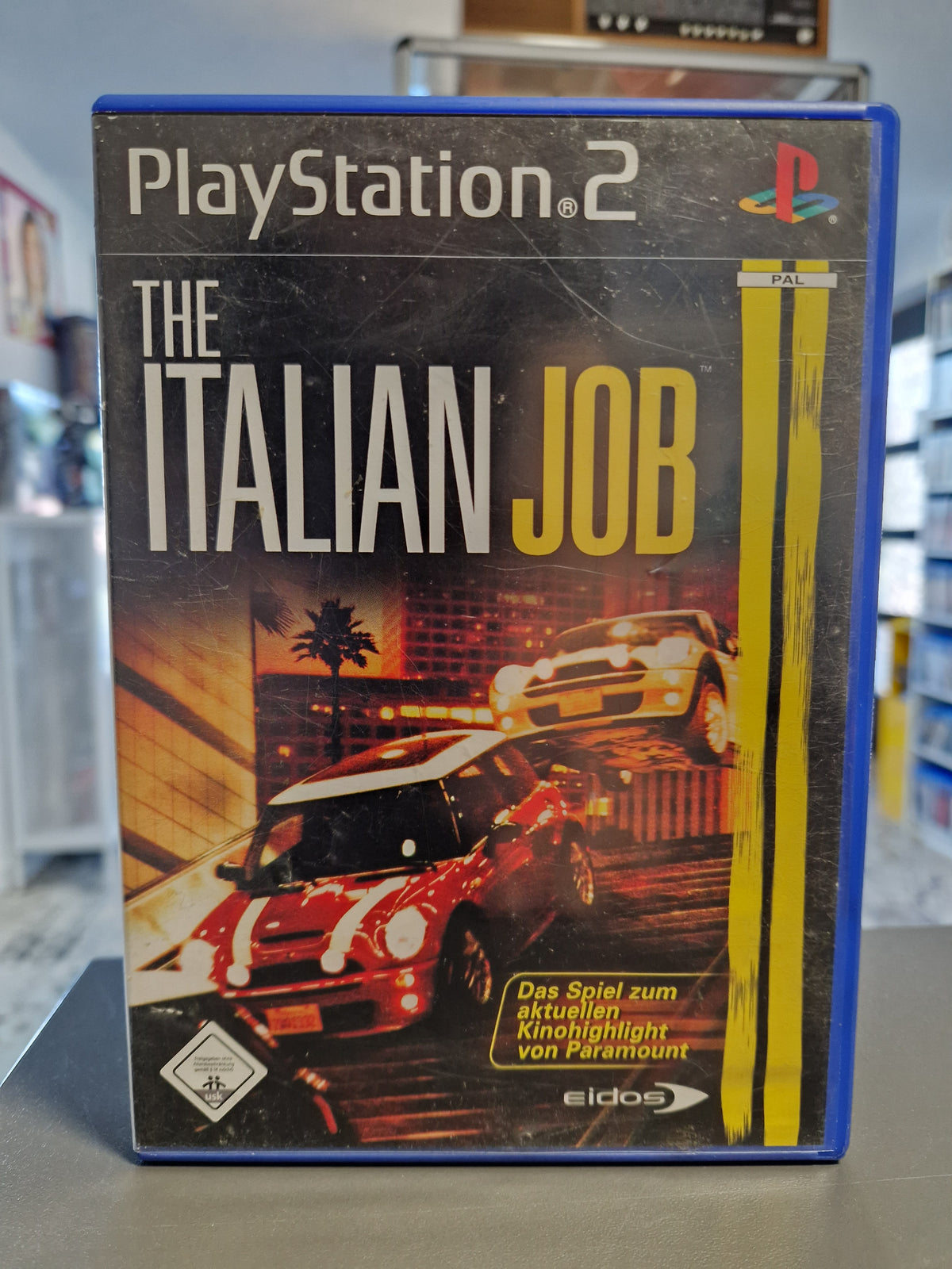 Vorderseite der PS2 Hülle von The Italian Job Das Spiel zum Kinofilm.