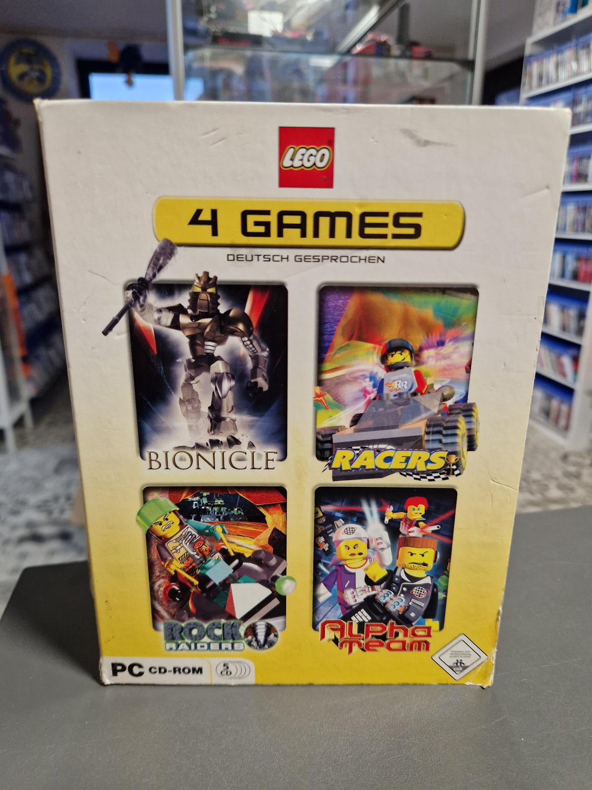 Vorderseite der PC Verpackung LEGO 4 Games mit Bionicle, Racers, Rock Raiders und Alpha Team.