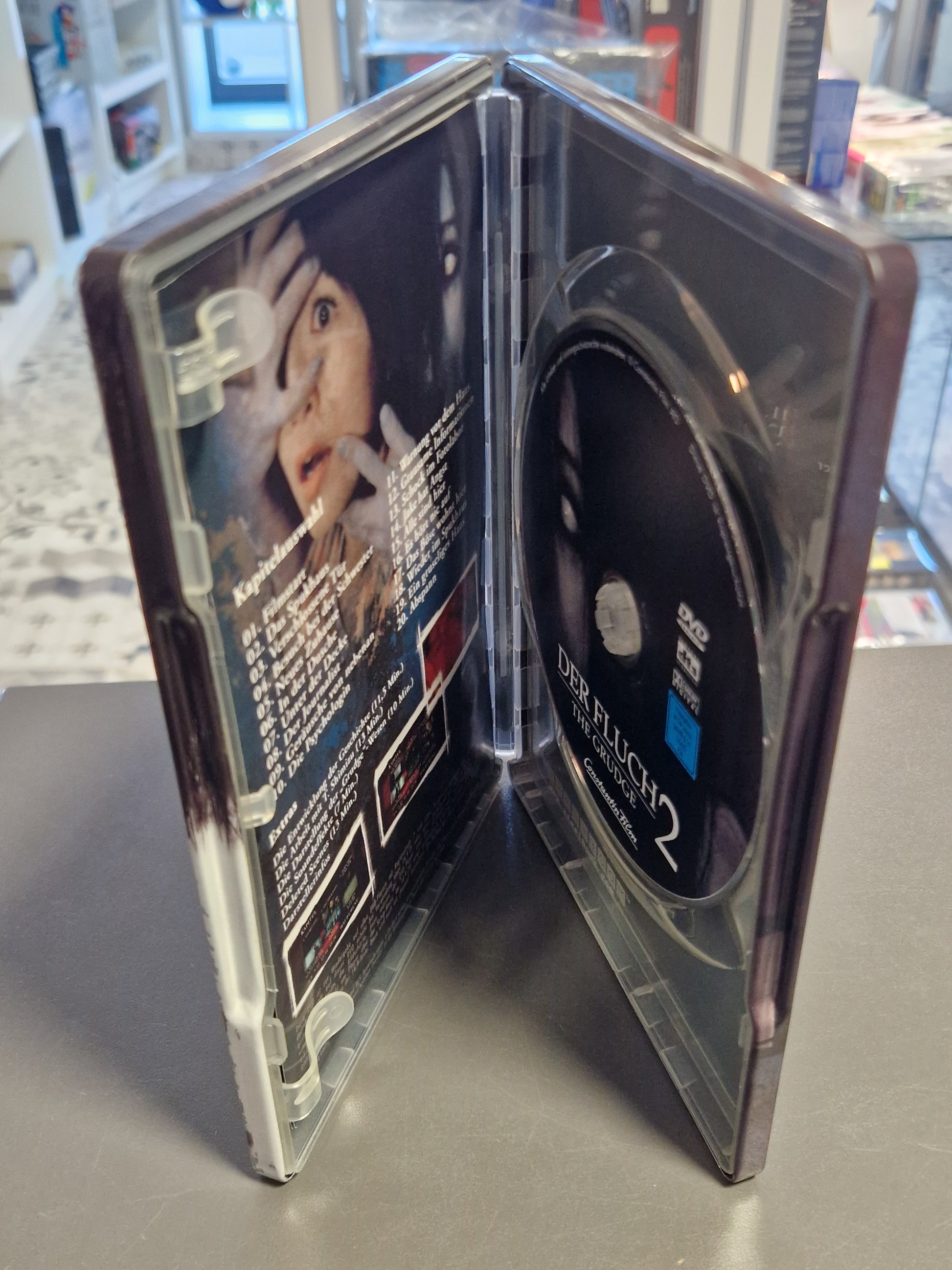 Geöffnetes Steelbook mit der Disc und dem atmosphärischen Innendruck.