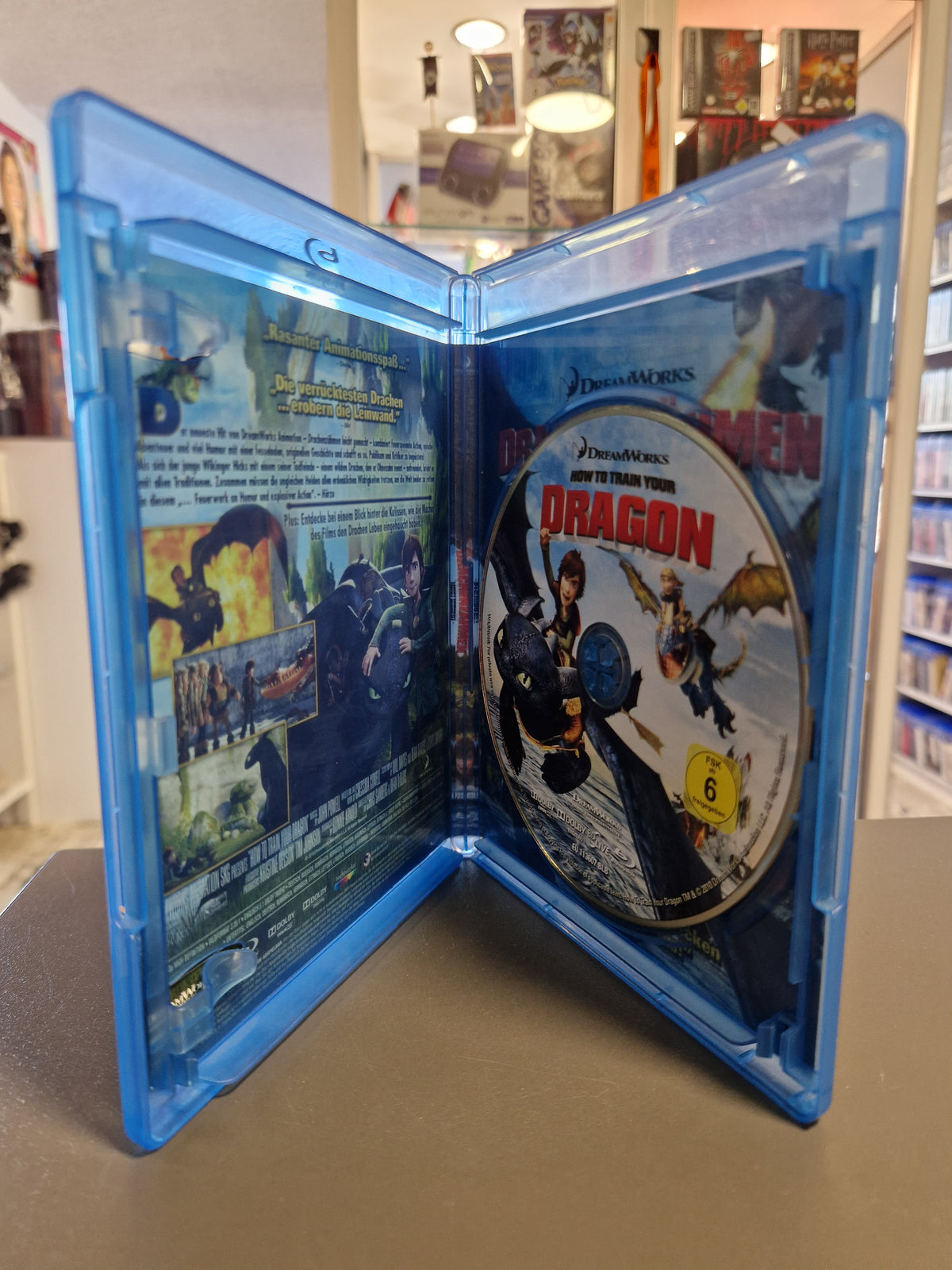 Geöffnete Blu-ray Hülle von Drachenzähmen leicht gemacht mit Disc.