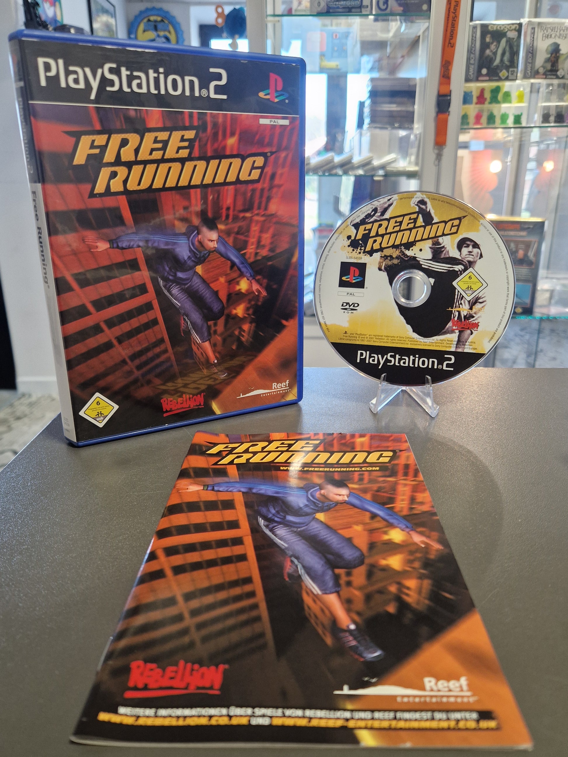 Originales Cover des PS2 Spiels Free Running, Sony PlayStation 2 Klassiker inklusive Anleitung.