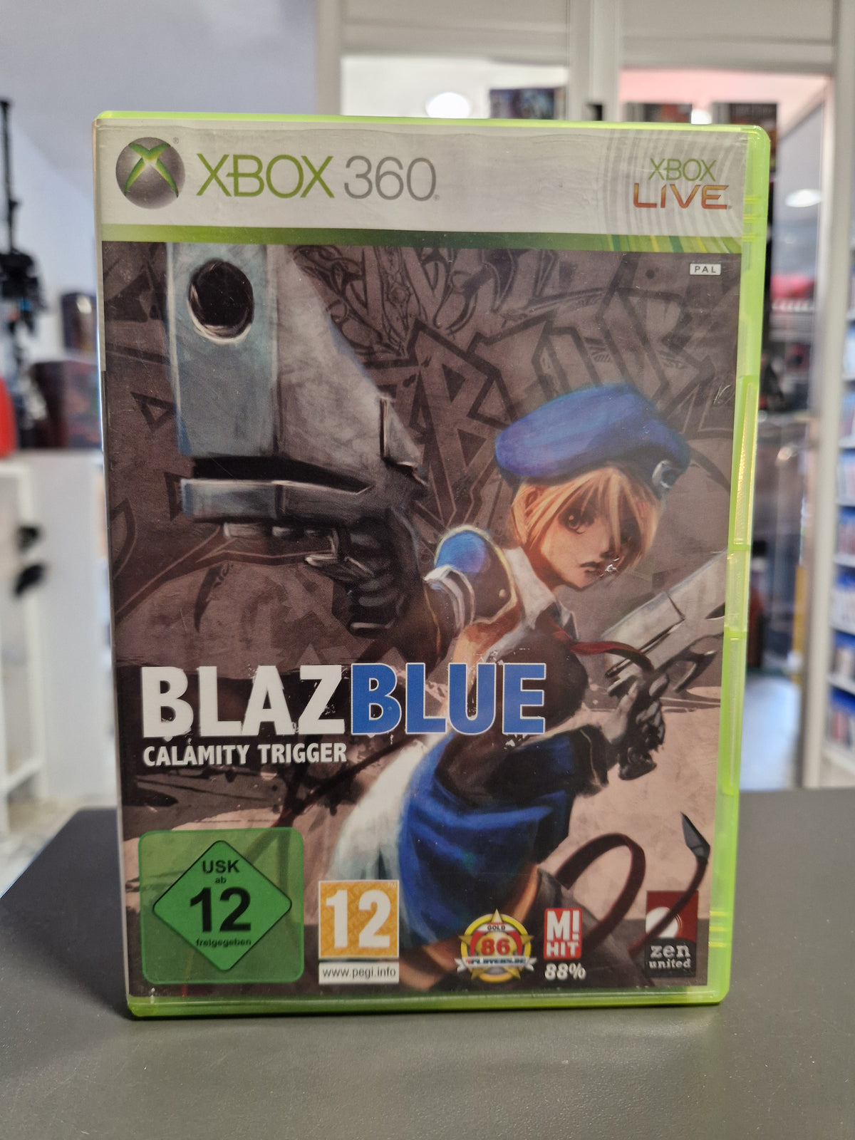 Vorderseite der Hülle von BlazBlue Calamity Trigger für Xbox 360.