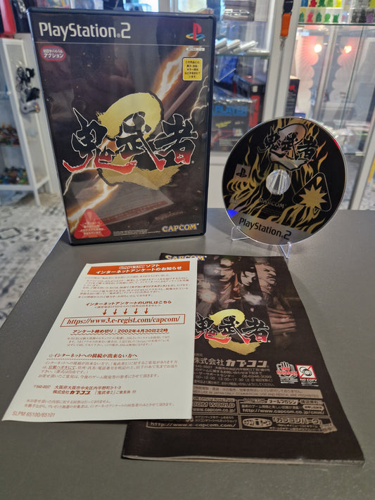 Onimusha 2 für PlayStation 2 (Japan Import NTSC-J). Komplettset mit Originalhülle, Anleitung, Registrierungskarte und goldener Disc. Sammlerzustand von Memory Lane.