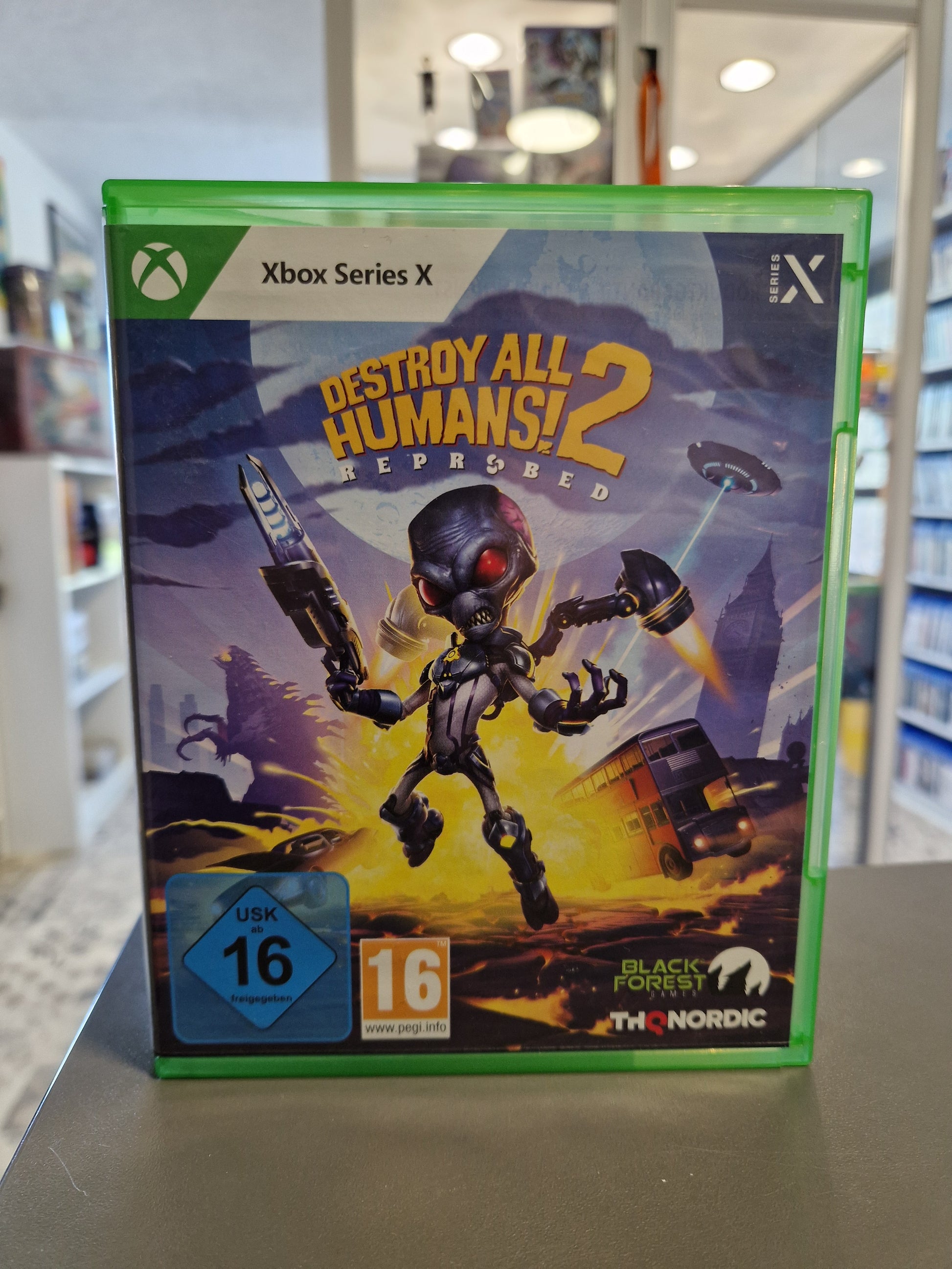 Xbox Series X Spielhülle von Destroy All Humans! 2 Reprobed in hervorragendem Zustand mit USK 16 Logo.