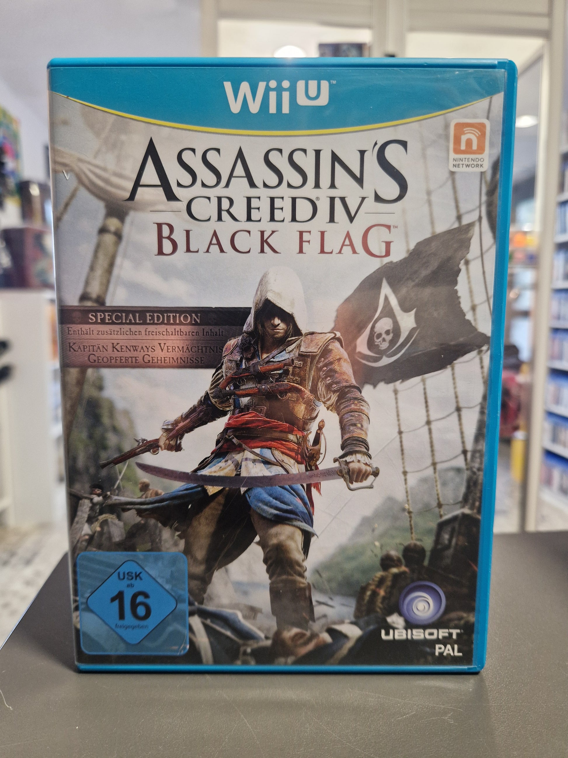 Vorderseite der Nintendo Wii U Hülle von Assassin's Creed IV Black Flag Special Edition mit USK 16 Logo bei Memory Lane Rhauderfehn.