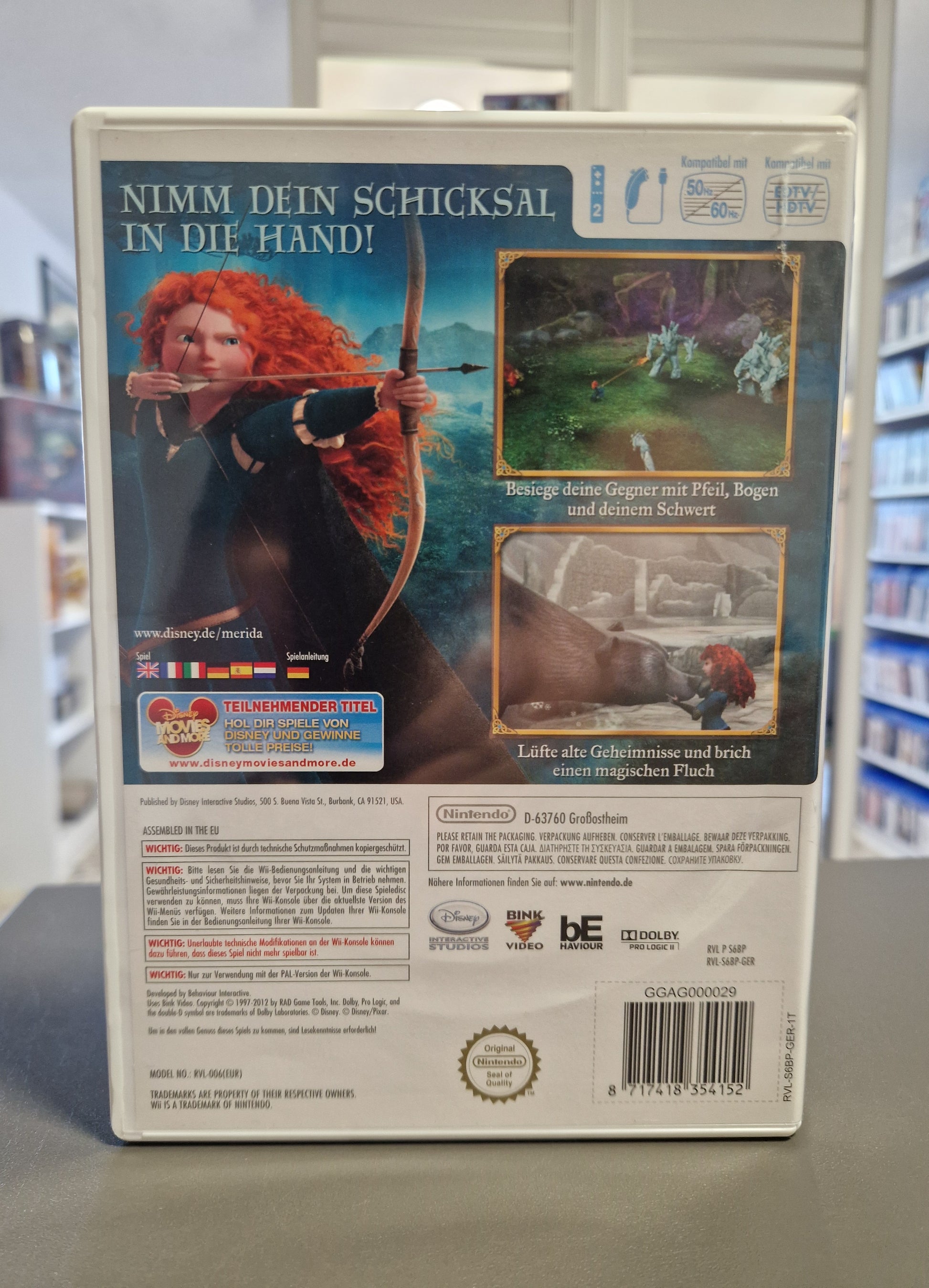 Rückseite der Merida Legende der Highlands Nintendo Wii Hülle mit Screenshots, Spielbeschreibung und Barcode 8717418354152.